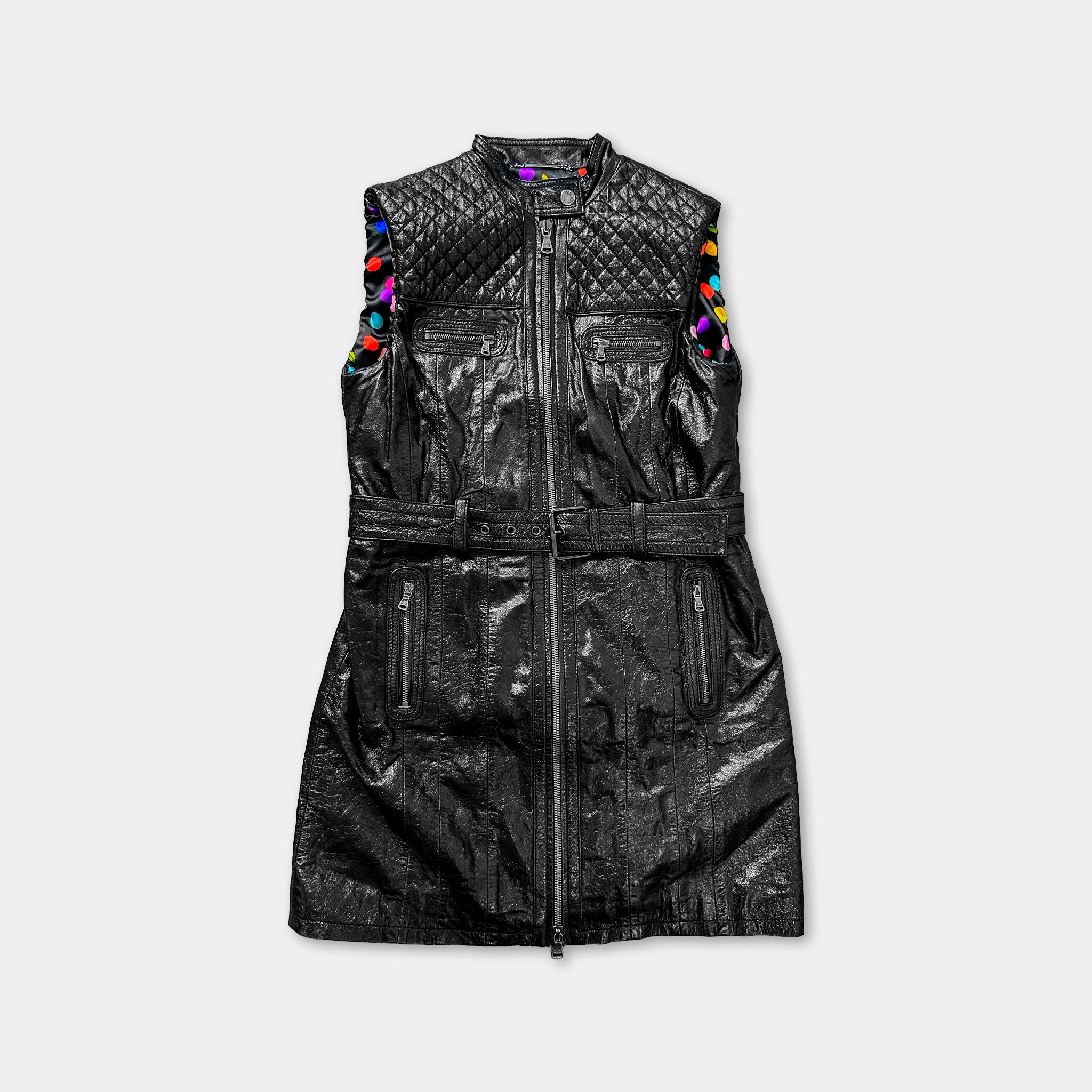 A black leather vest with colorful patterns on the sleeves and a zipper closure.