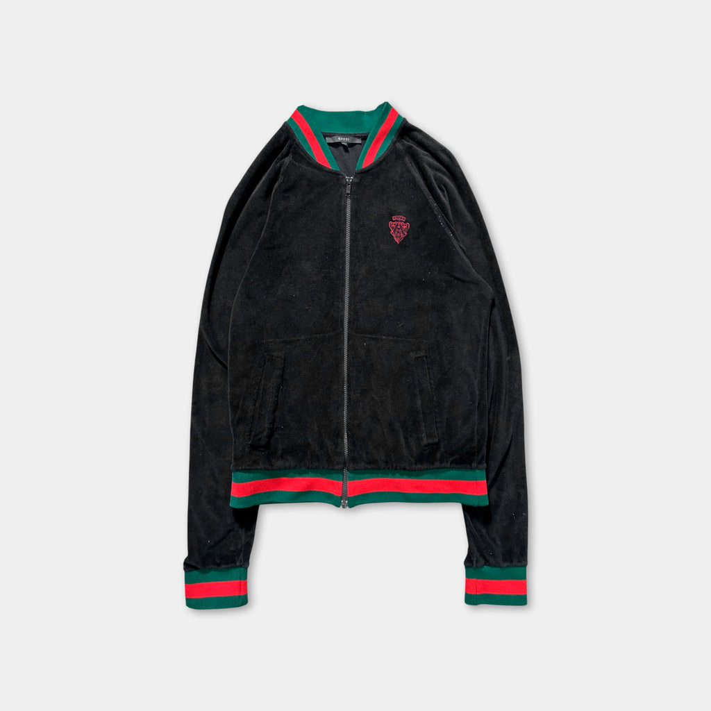 A black zip-up jacket with red and green stripes on the sleeves and collar.