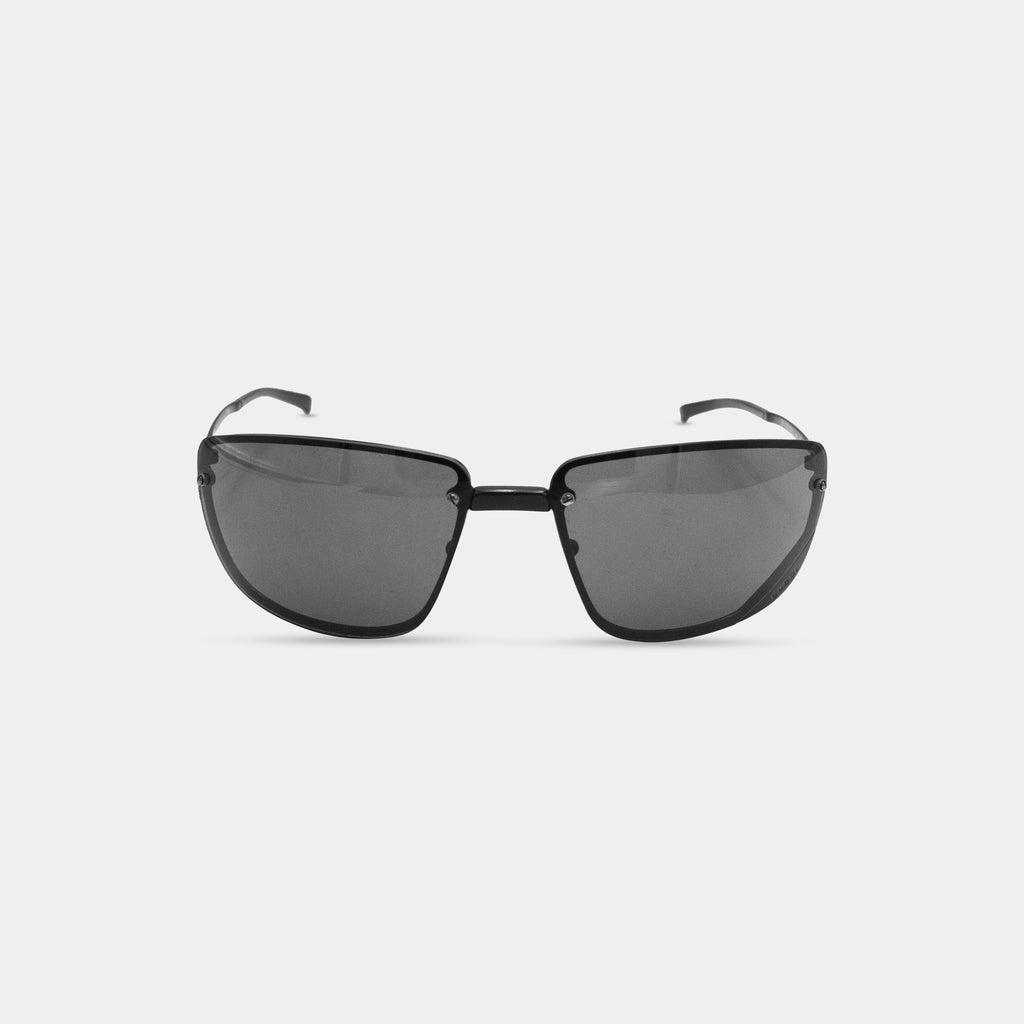 A pair of black sunglasses with dark lenses.