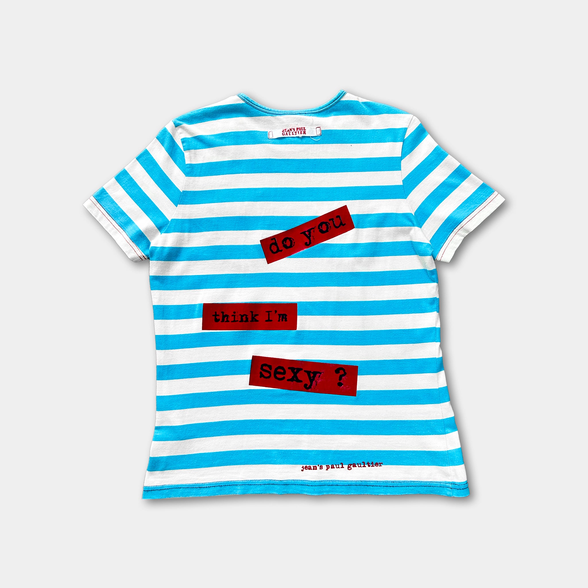 A blue and white striped t-shirt with the text "do you think I'm sexy?" printed on it.