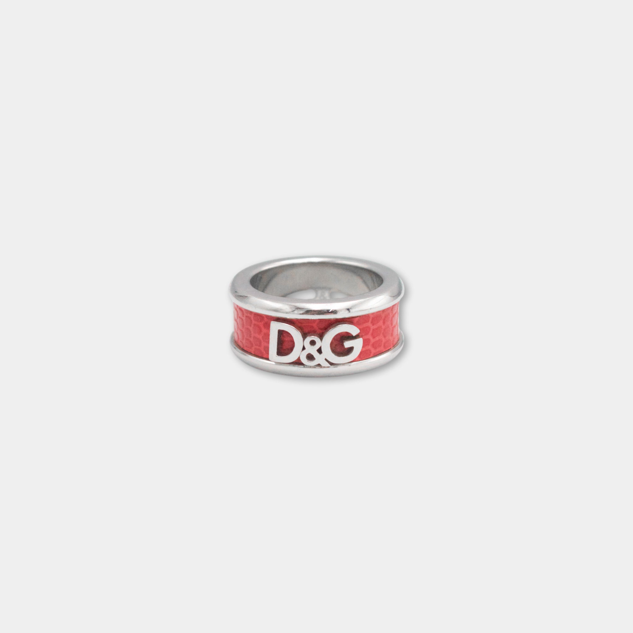 A ring with the D&G logo prominently displayed on it.