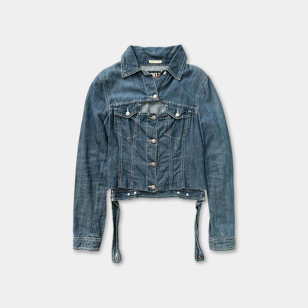 A denim jacket with a button-down front and long sleeves, displayed against a plain background.