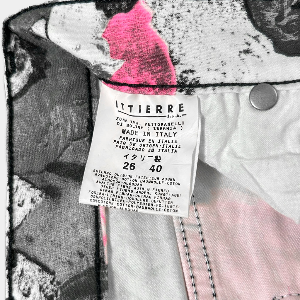 a close-up of a label on a piece of clothing, with a black and white background.