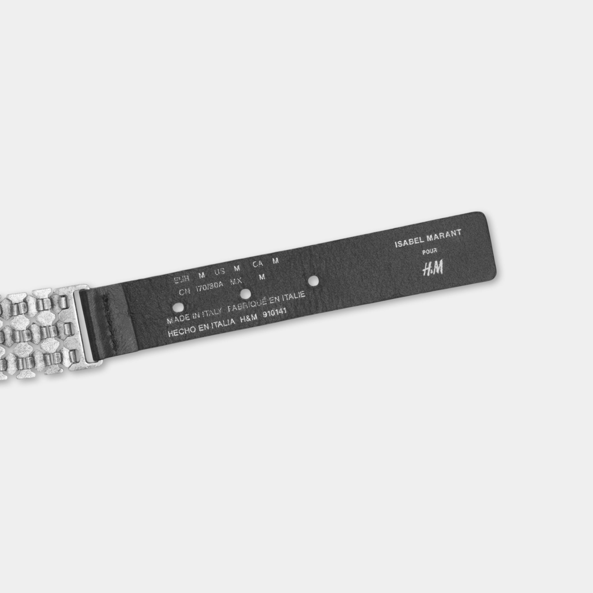 A black and silver watch strap with text printed on it.