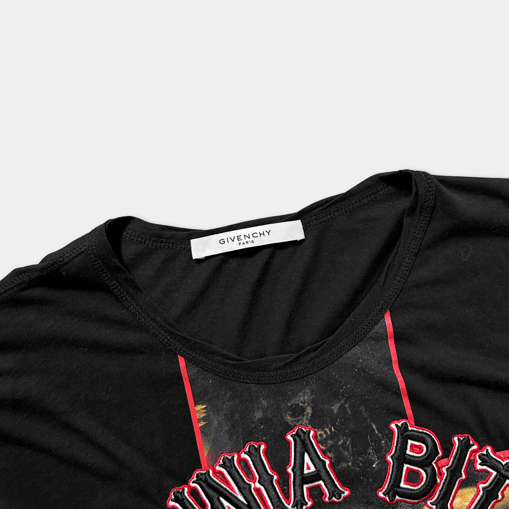 a black t-shirt with a red and black graphic design on the front.