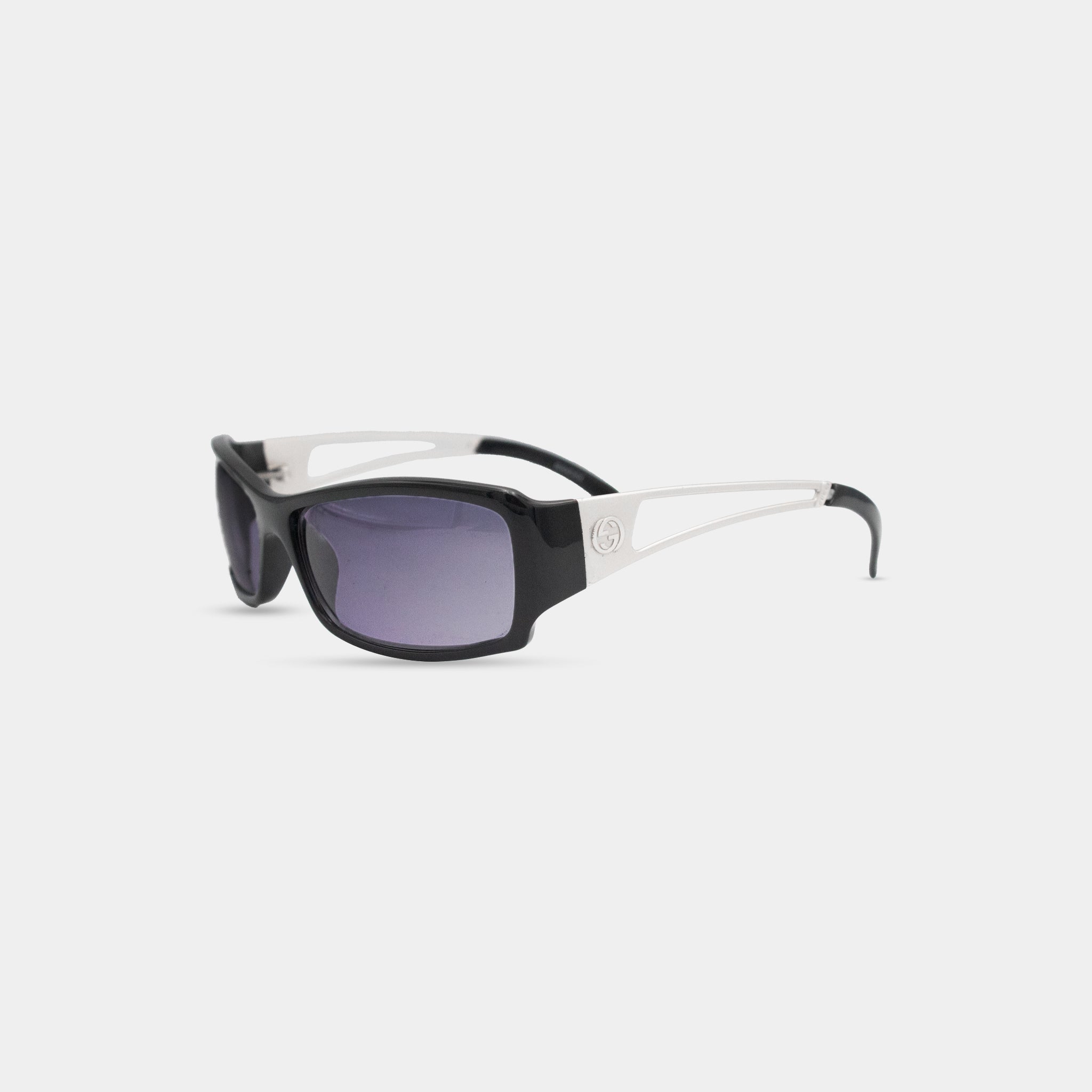A pair of black and white sunglasses with a white frame.