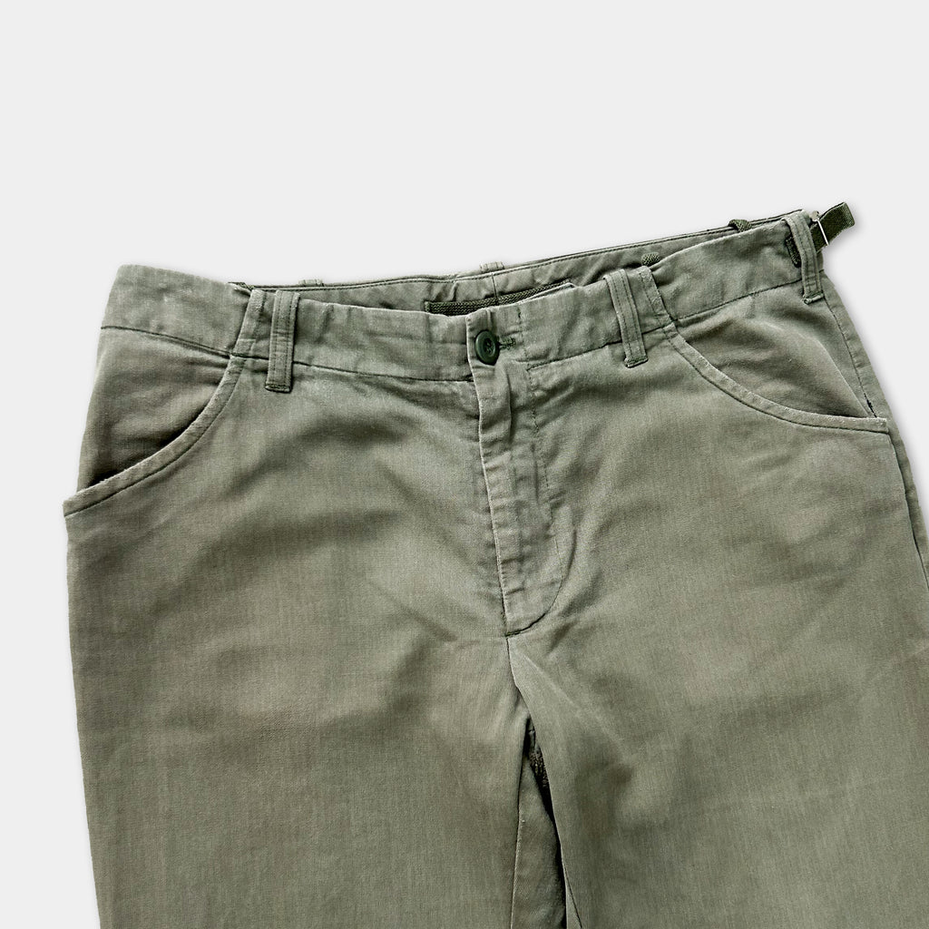 A pair of khaki cargo pants with a button waistband and pockets.