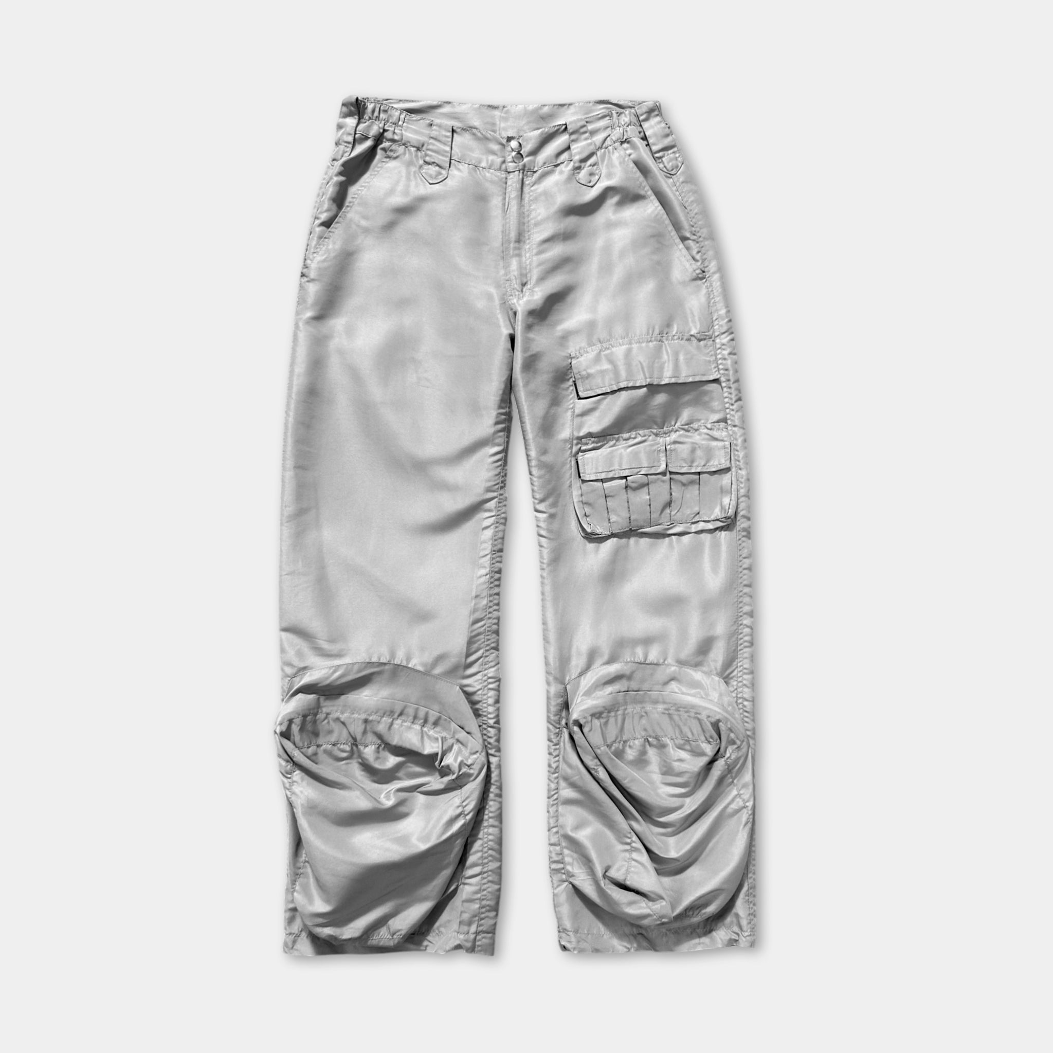 A pair of gray pants with multiple pockets and a zipper closure.