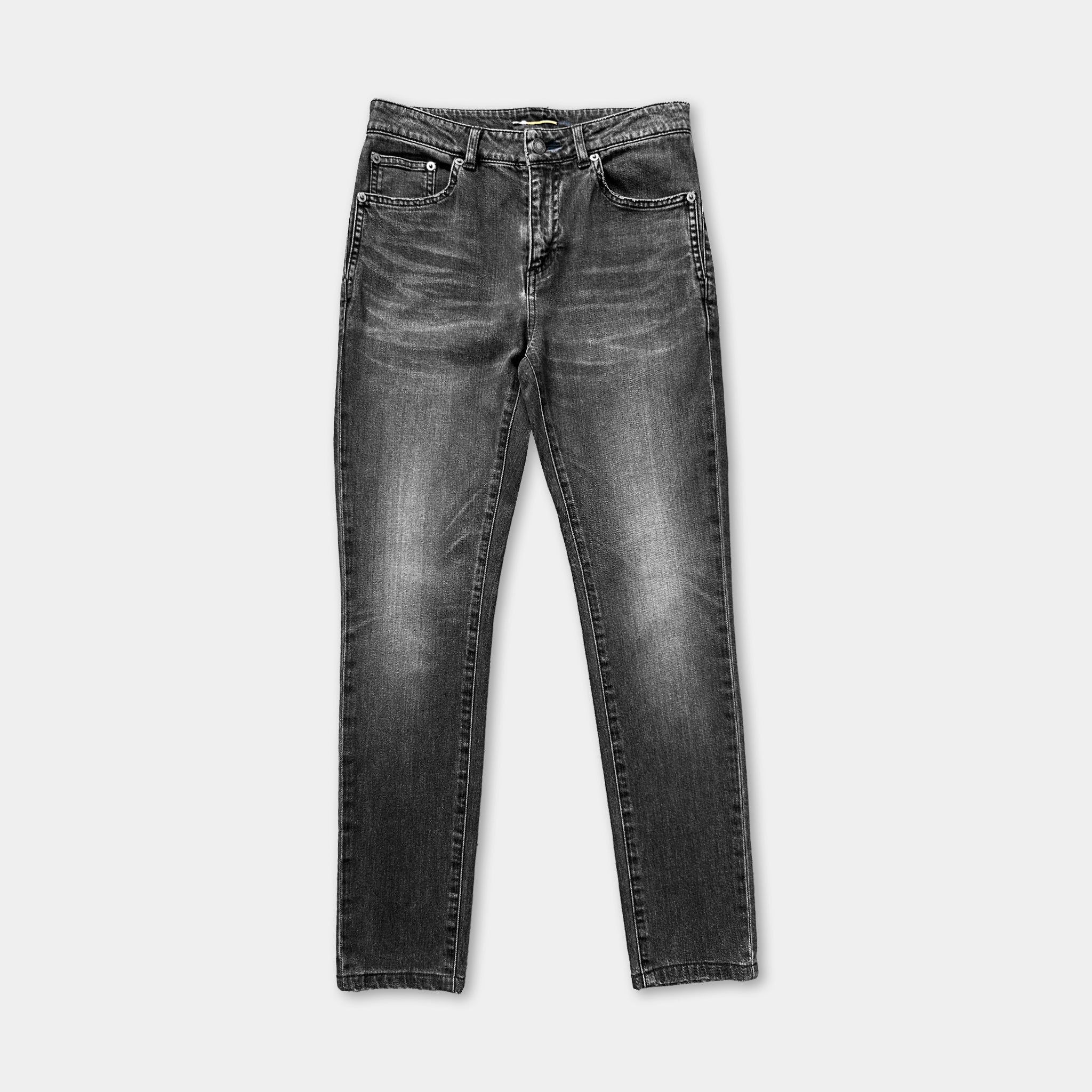 A pair of black jeans against a white background.