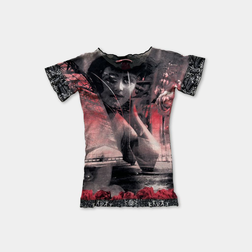The image is a t-shirt with a graphic design featuring a woman's face and a red background.