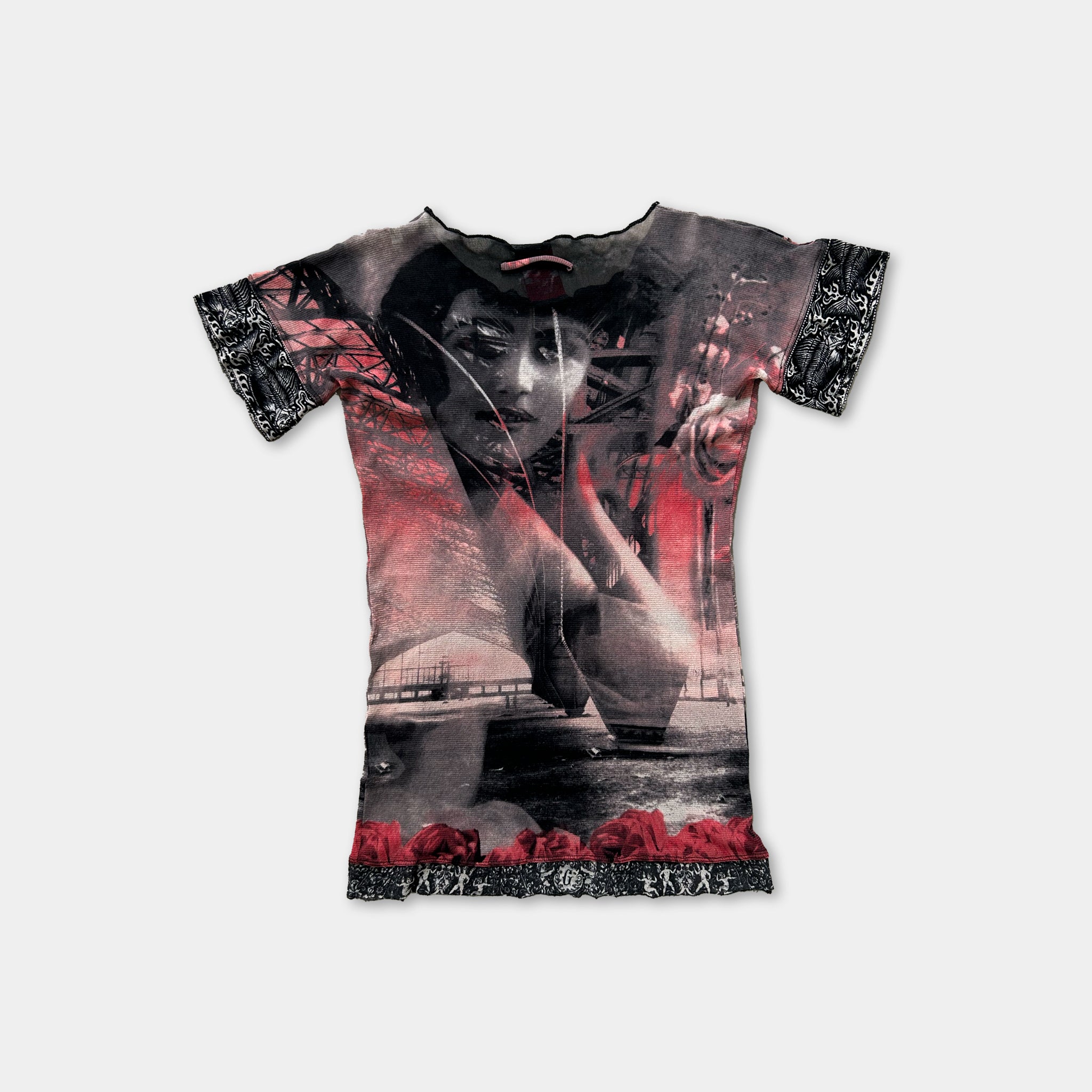 The image is a t-shirt with a graphic design featuring a woman's face and a red background.