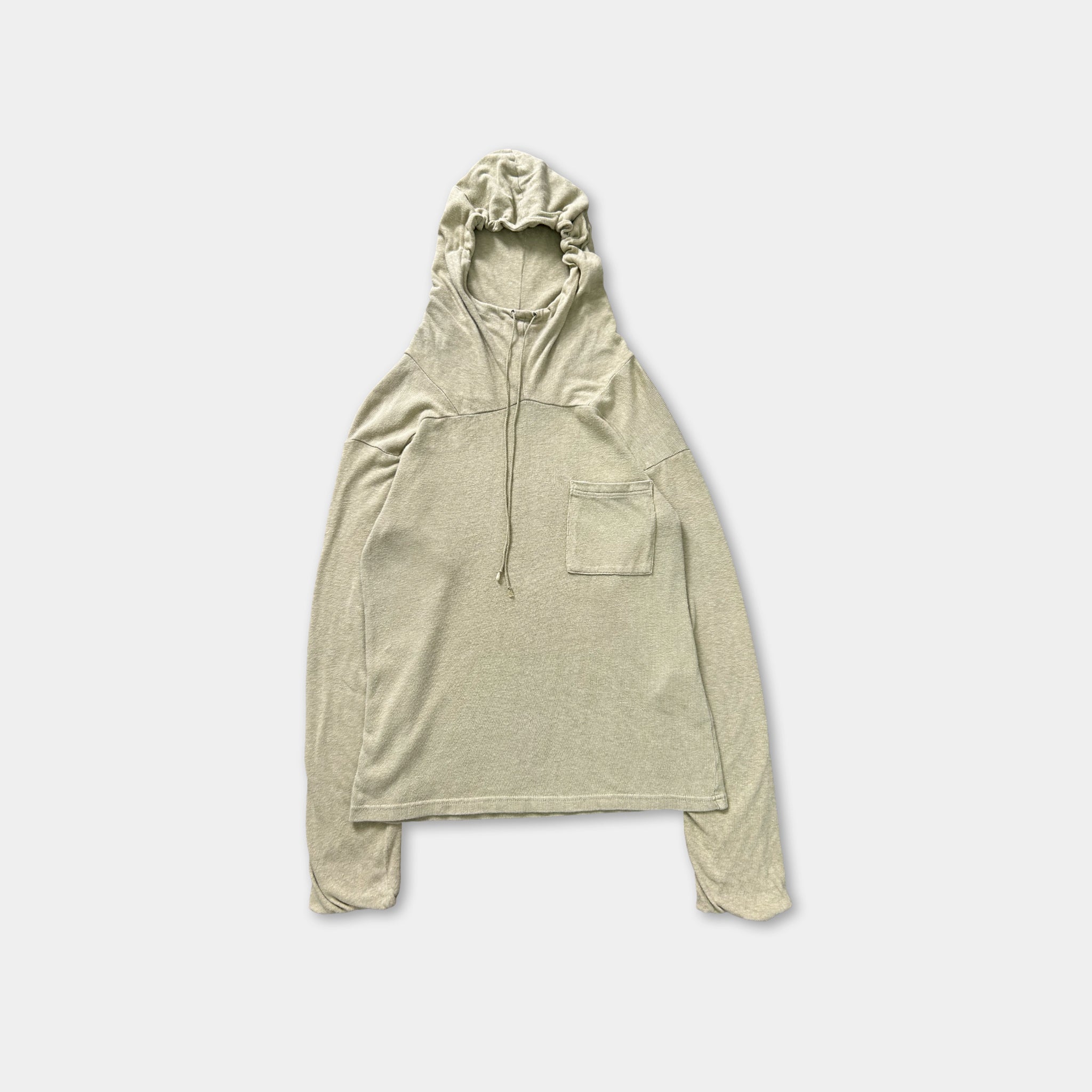 A beige hooded sweatshirt with a front pocket is shown against a plain white background.
