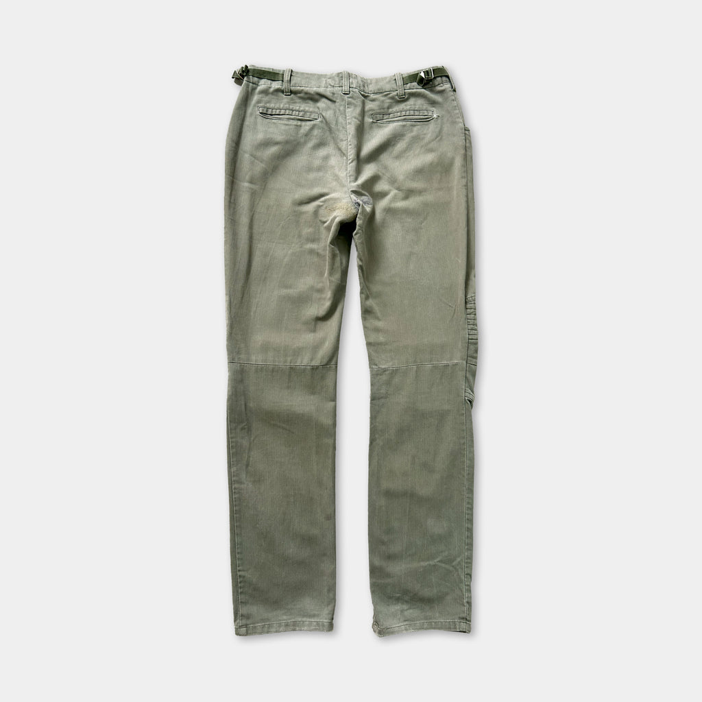 A pair of olive green cargo pants with a belt, displayed against a plain background.