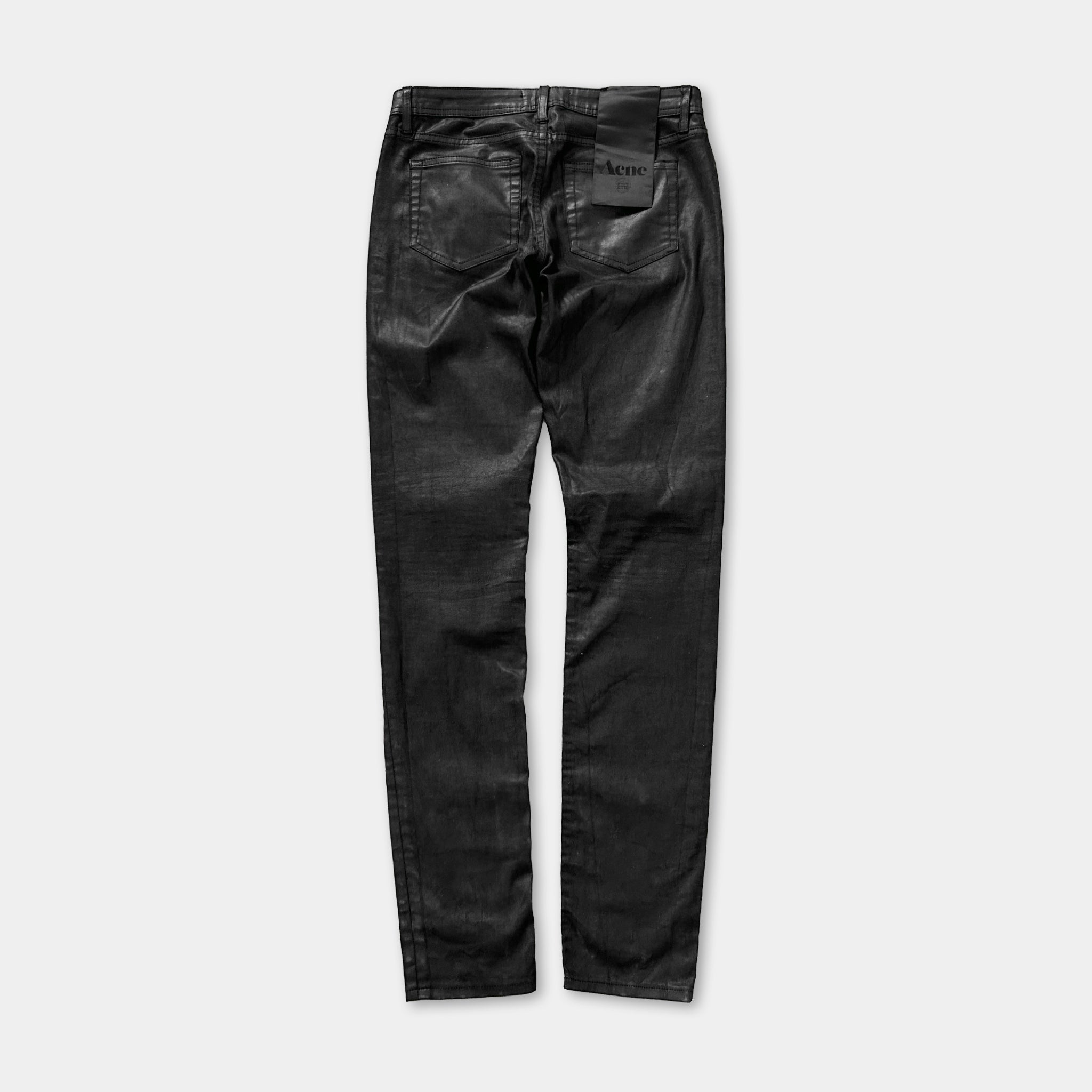 A pair of black leather pants with a pocket on the back.