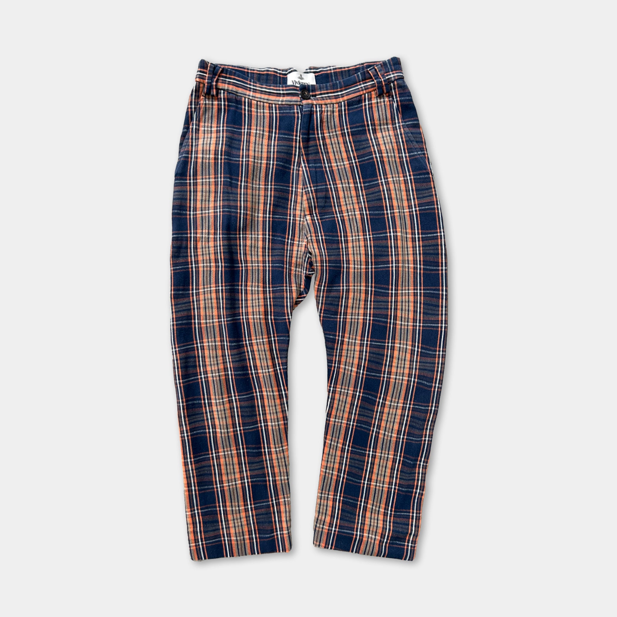 A pair of plaid pants with a distinctive pattern of orange and blue stripes.
