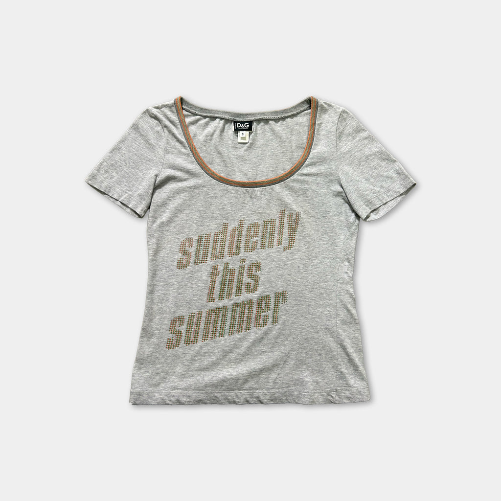 A gray t-shirt with the text "suddenly this summer" printed on it.