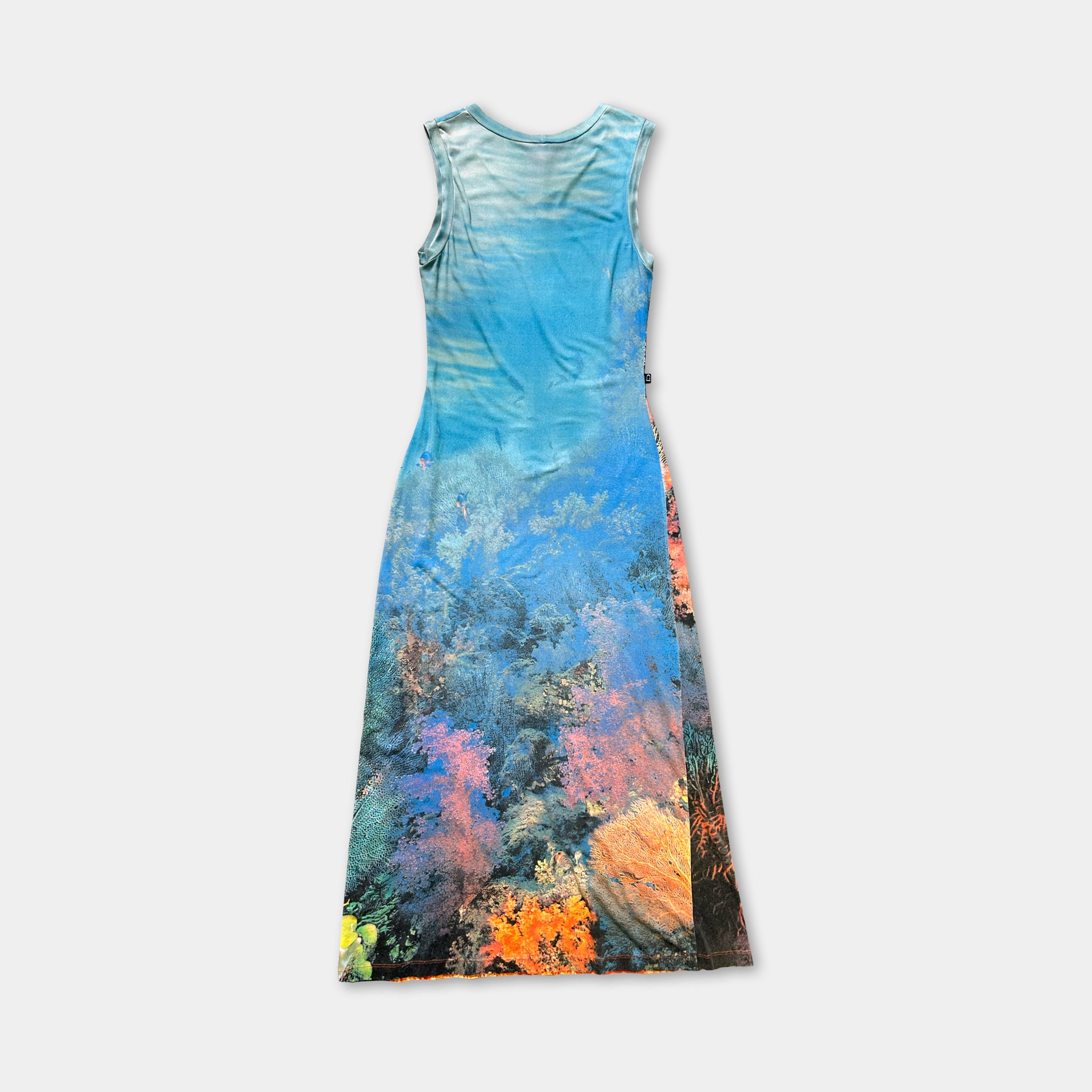 A sleeveless dress with a vibrant, colorful print depicting a tropical or underwater scene.