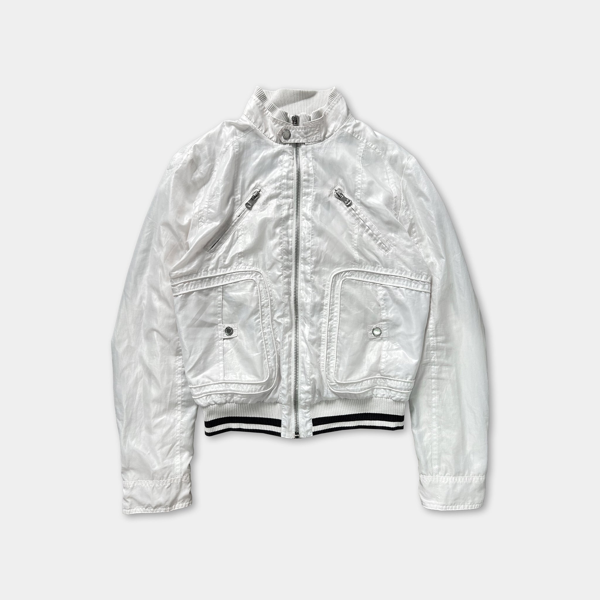 A white jacket with a zipper and two pockets, displayed against a plain background.