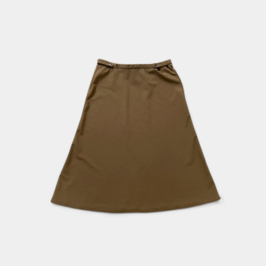 A brown skirt is shown against a white background.