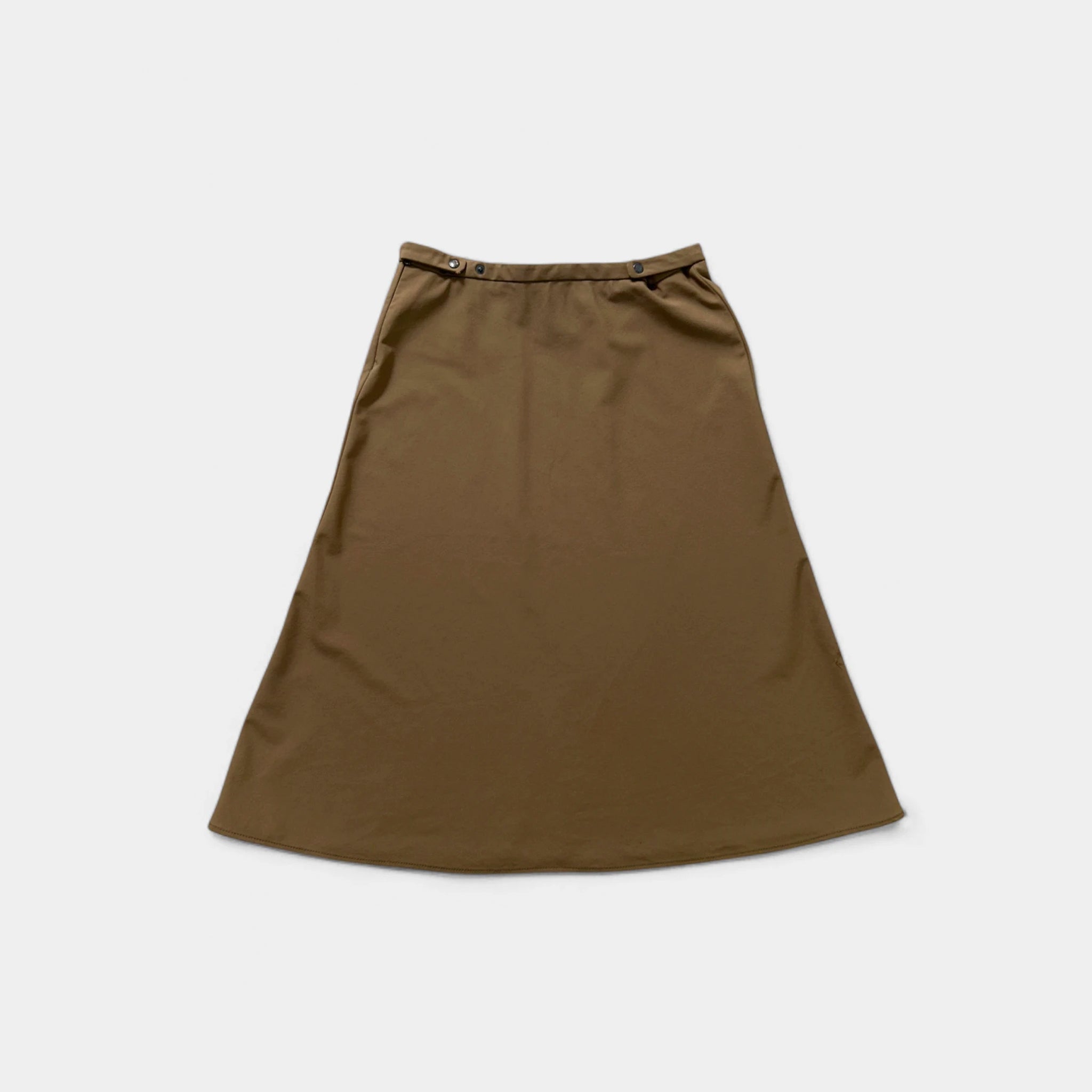A brown skirt is shown against a white background.