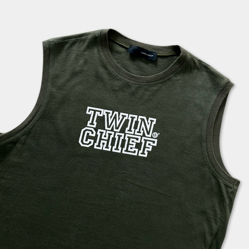 A dark green sleeveless t-shirt with the text "TWIN CHIEF" printed on it in white lettering.