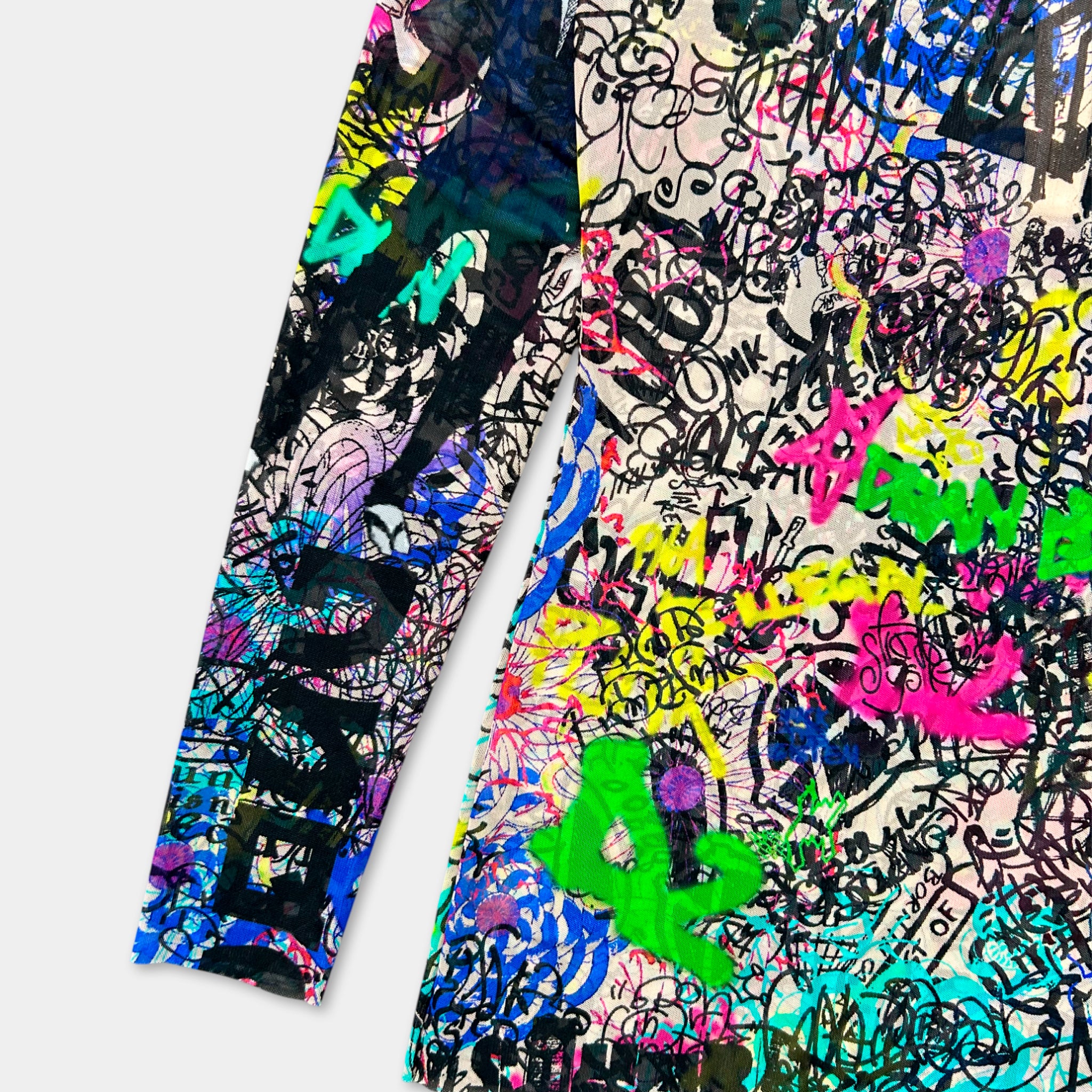 The image is a colorful and vibrant collage of various graffiti-style designs and patterns, including a mix of bright colors, abstract shapes, and stylized text.