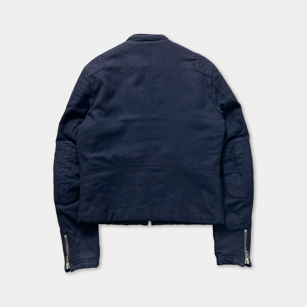 A navy blue jacket with a zipper and two pockets on the sleeves.