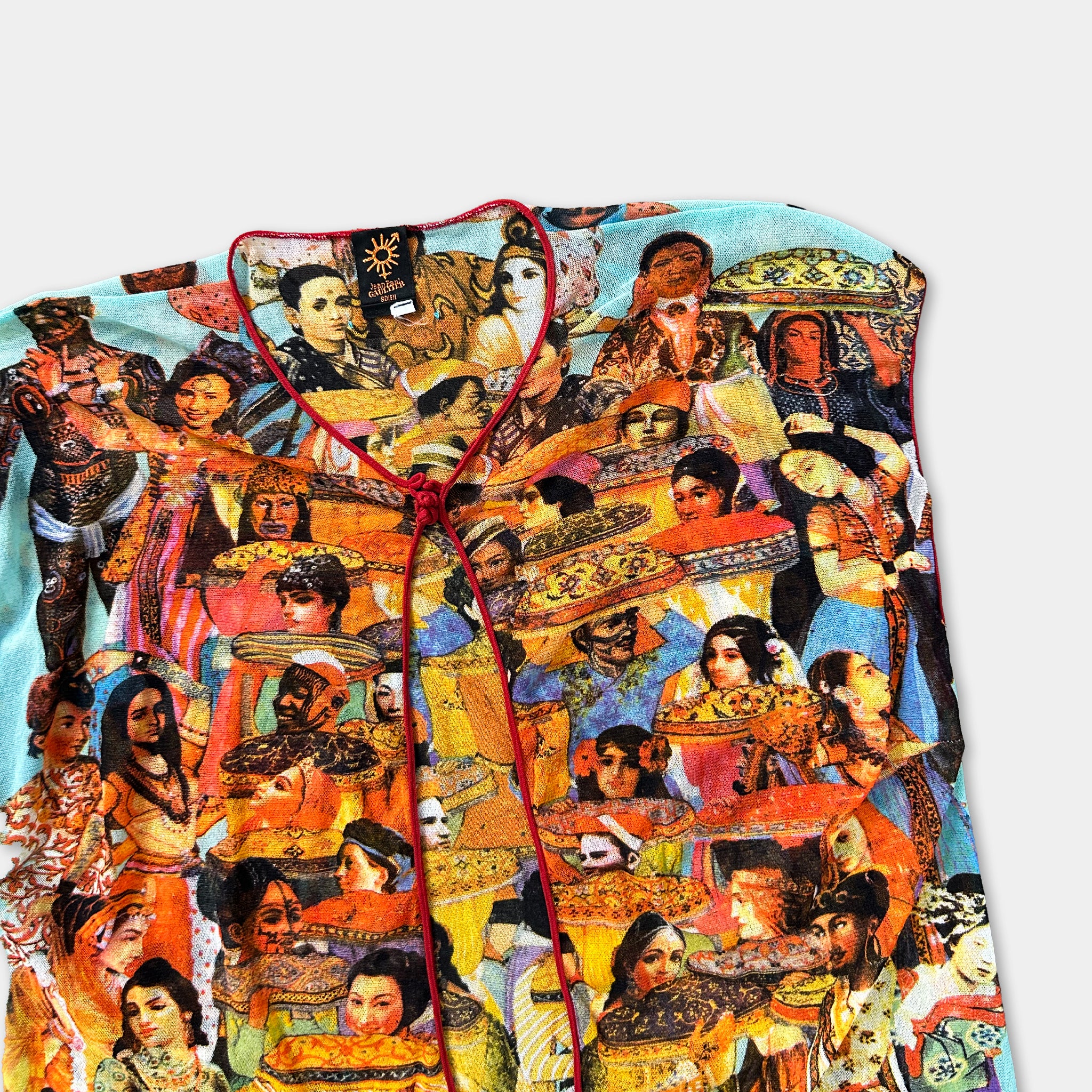 The image is a collage of various colorful and diverse images, including people, animals, and abstract shapes, arranged in a visually striking manner.