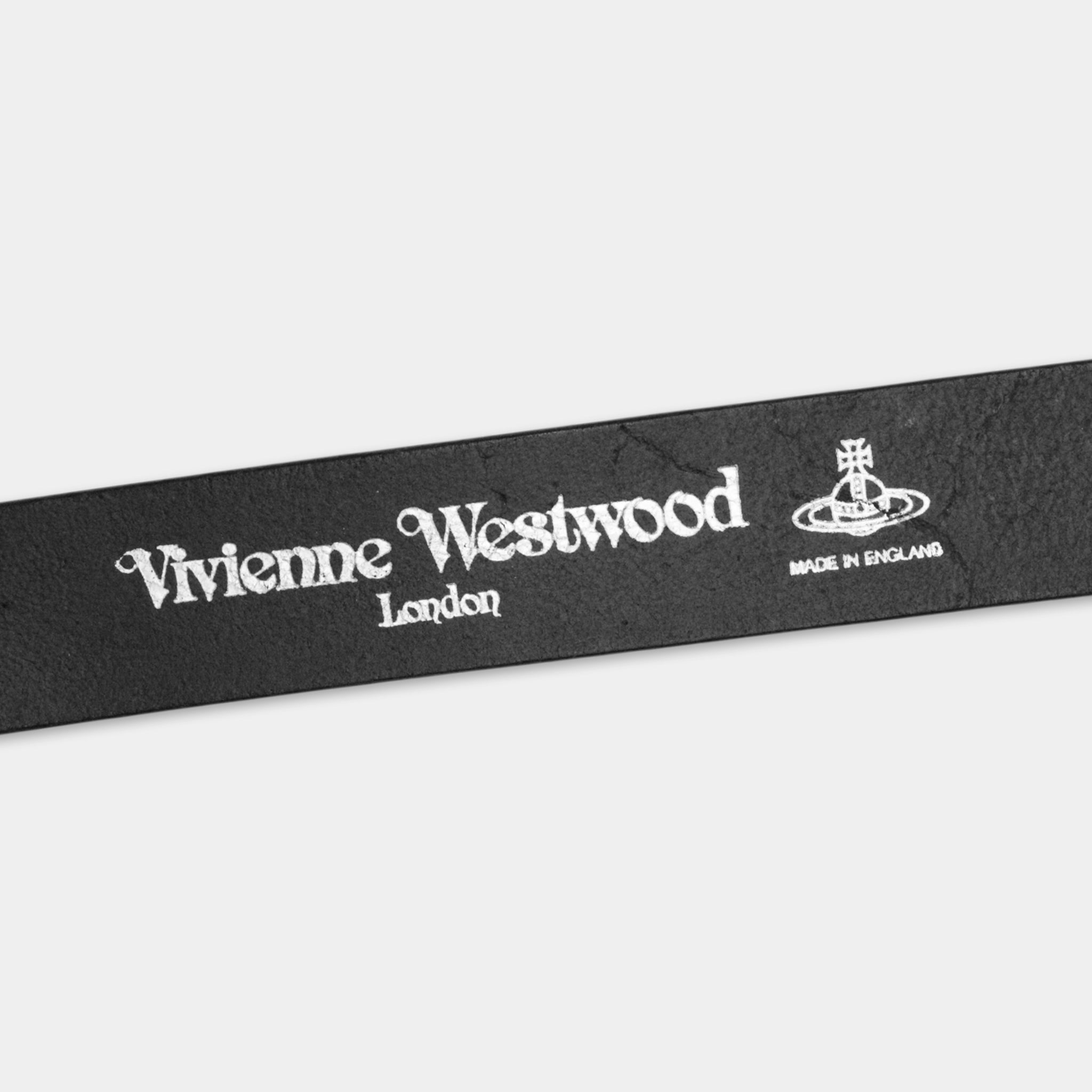 A black belt with white text and logos.