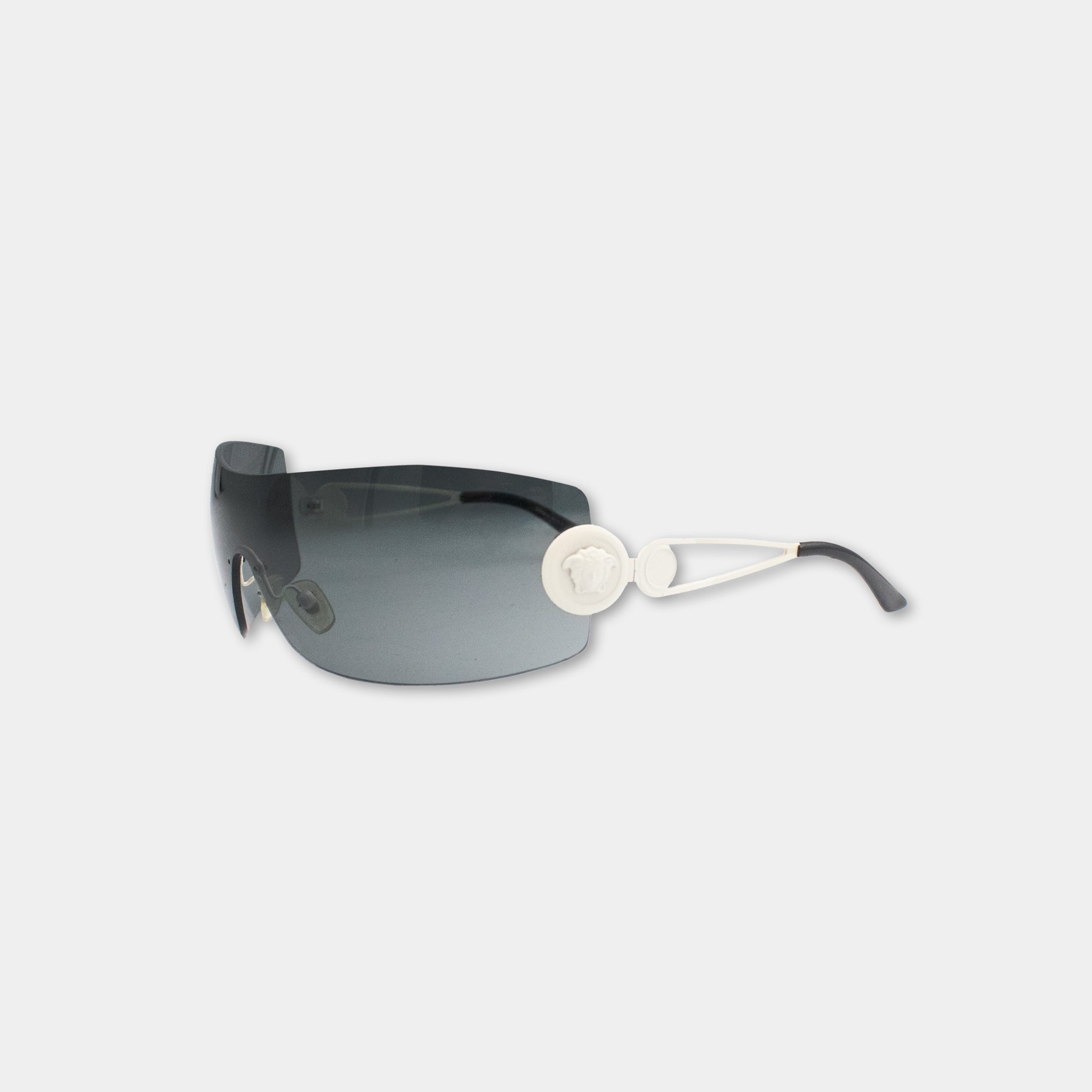 A pair of sunglasses with a black frame and a white logo on the side.