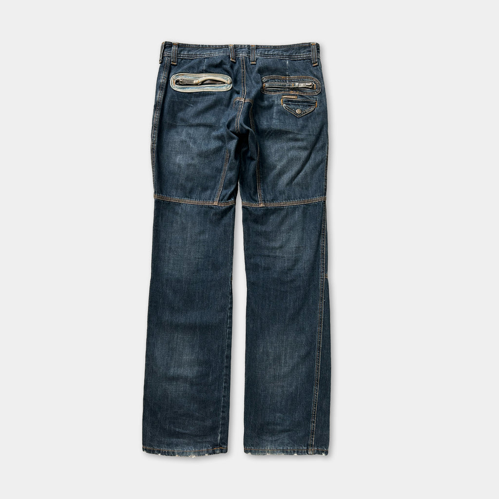 A pair of blue jeans with a zipper pocket and a button closure.