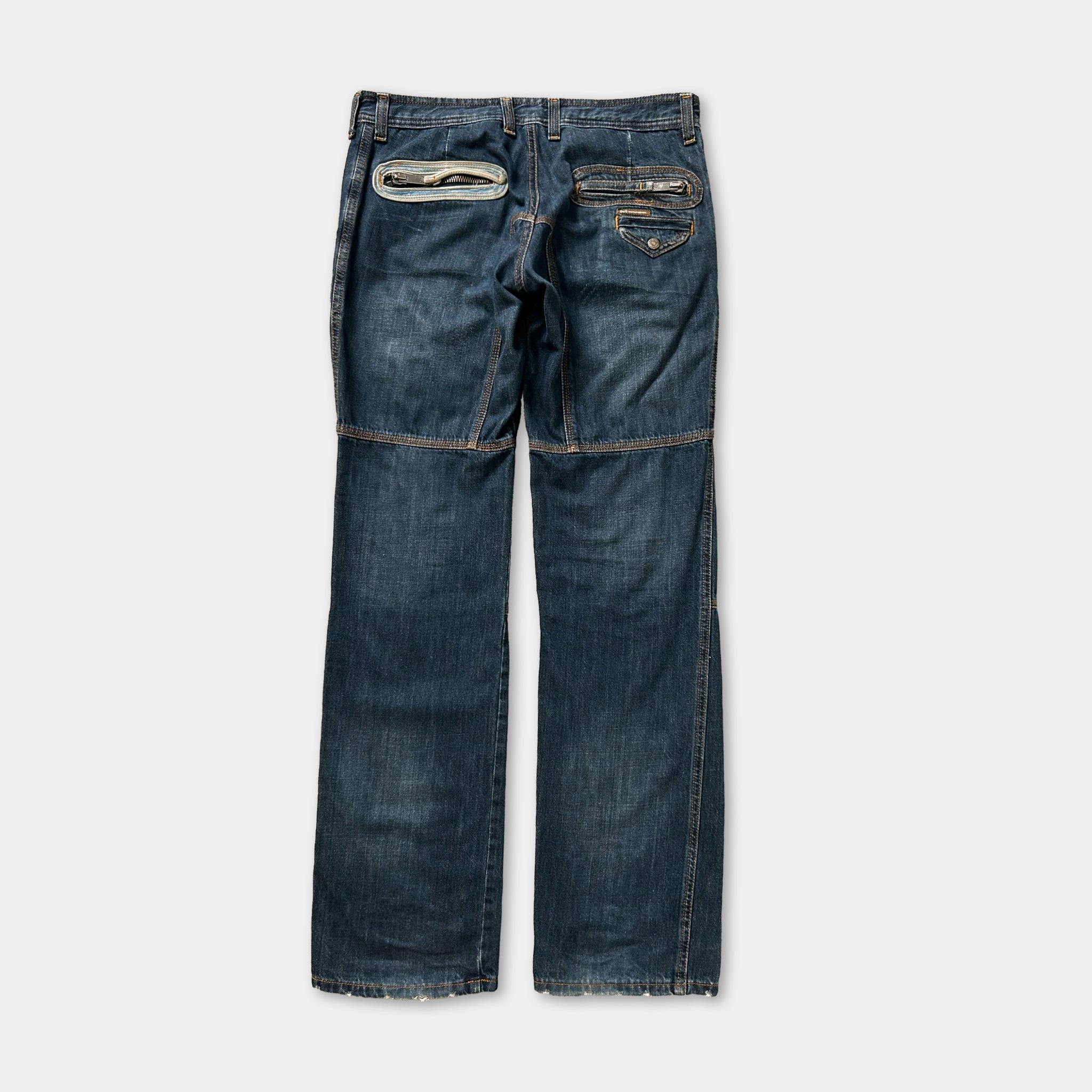 A pair of blue jeans with a zipper pocket and a button closure.