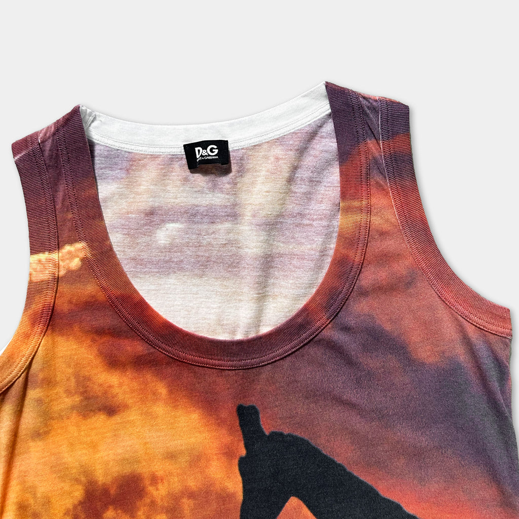 a close-up view of a colorful tank top with a printed design on the front.