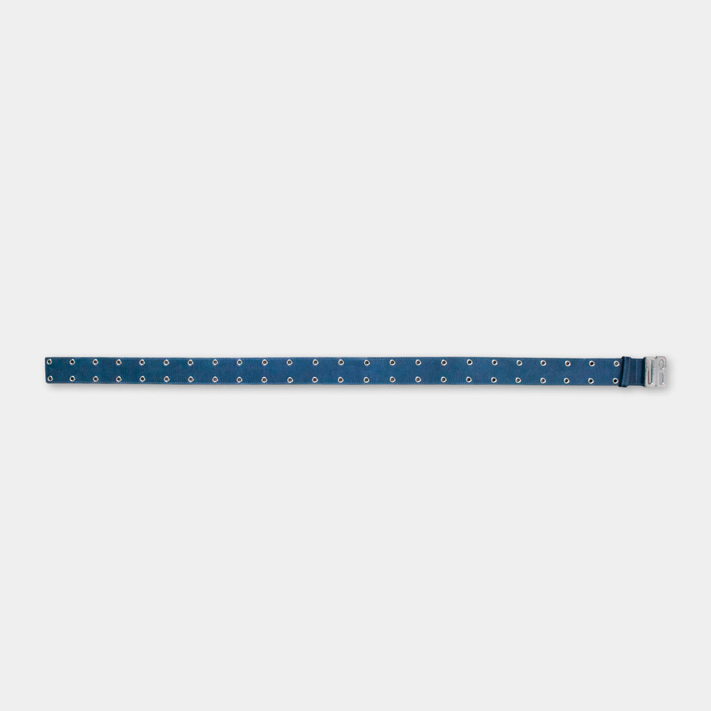 A blue belt with small circular holes is shown against a plain white background.