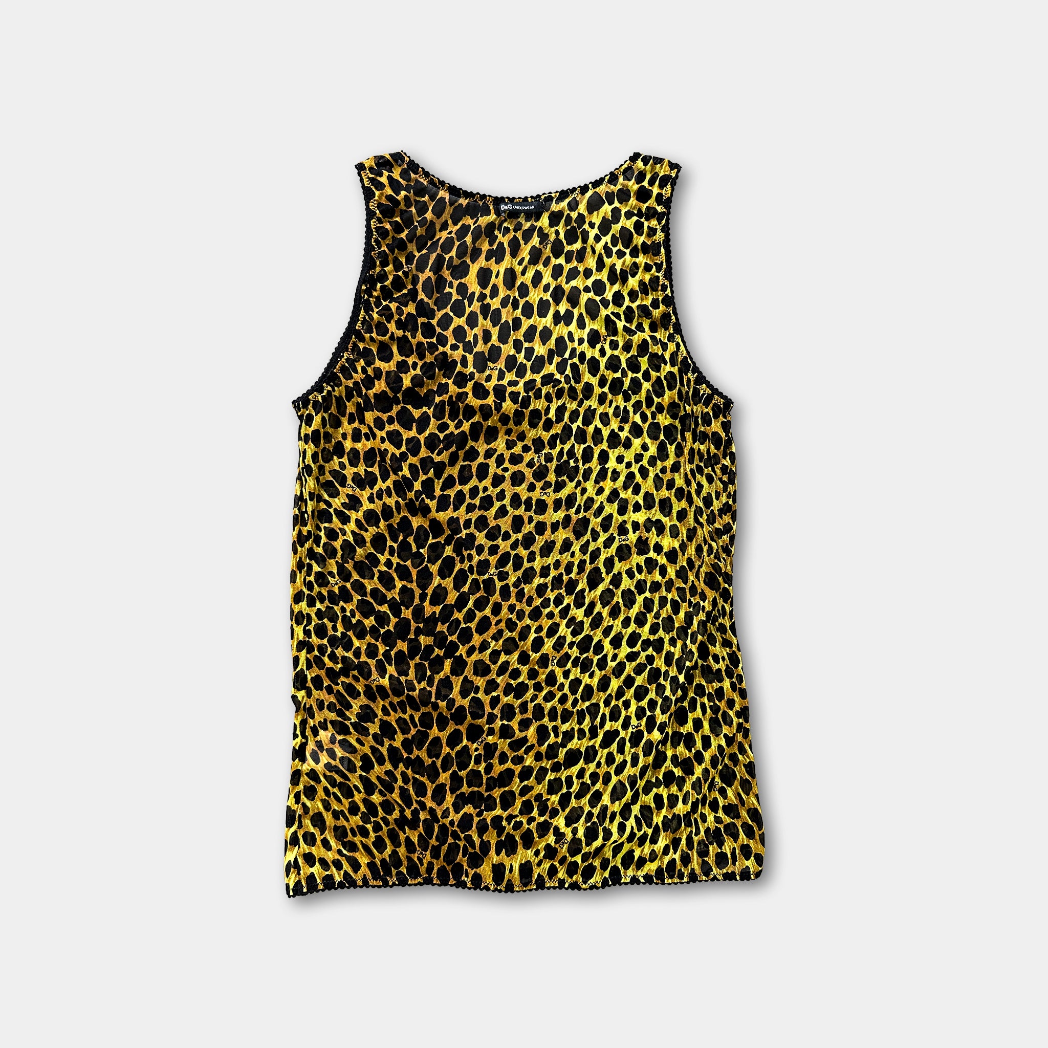 A yellow and black leopard print top is displayed against a white background.