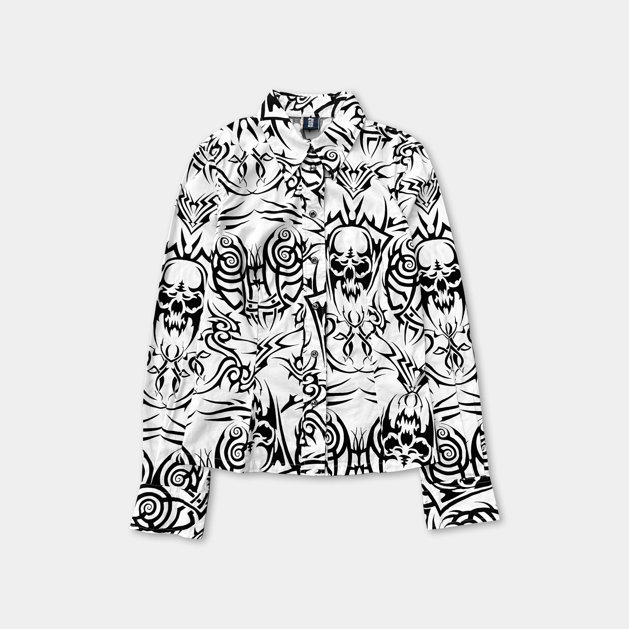 a black and white patterned shirt with a skull and crossbones design.