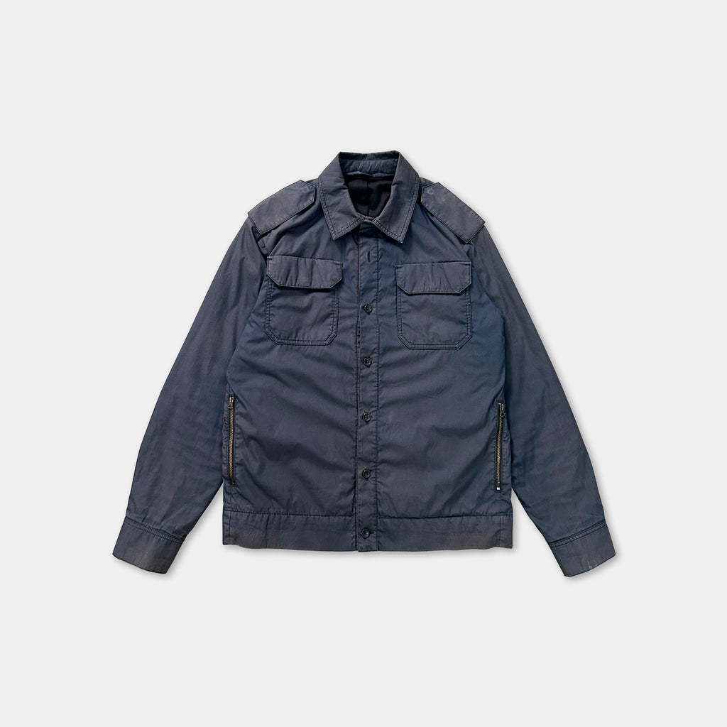 A dark blue jacket with a button-down front and two pockets, displayed against a white background.