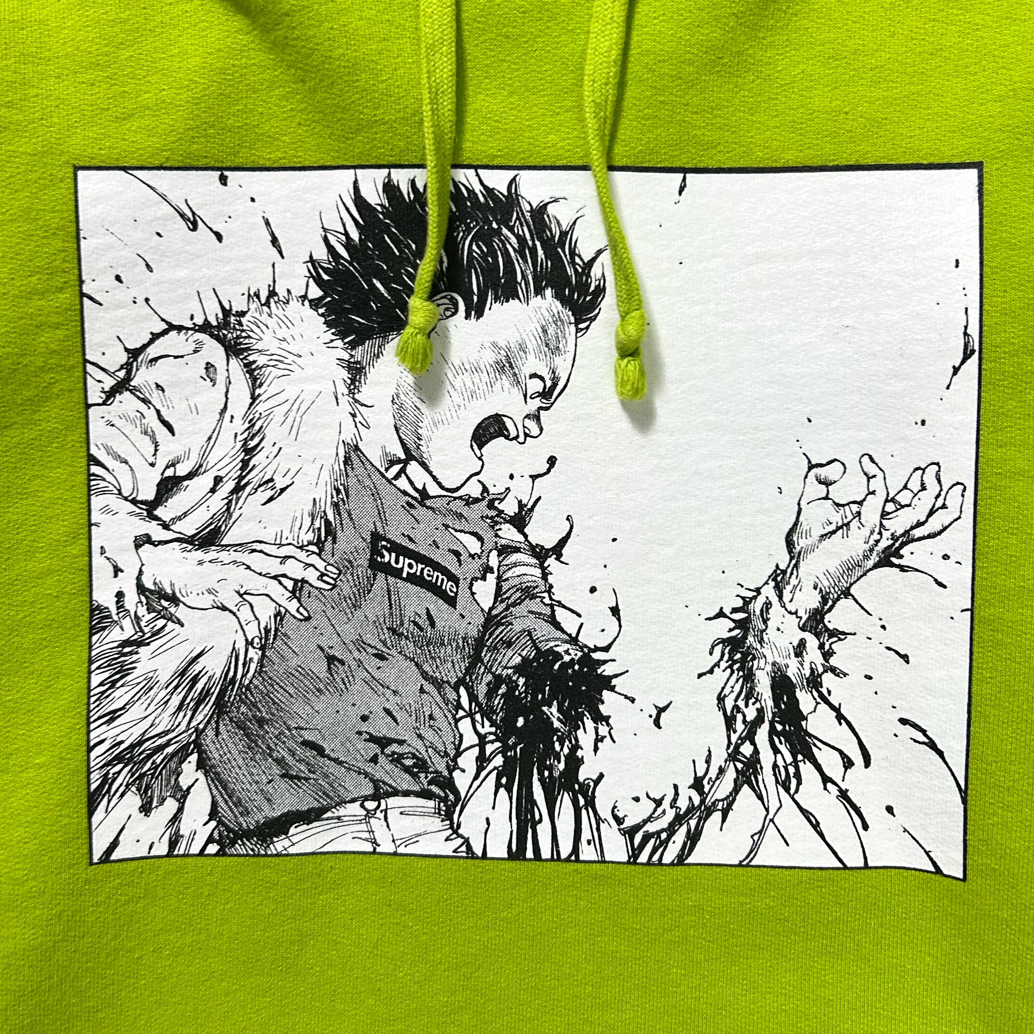 A black and white illustration of a person with spiky hair, wearing a grey shirt with the word "Supreme" on it, appears to be in a dynamic fighting stance.