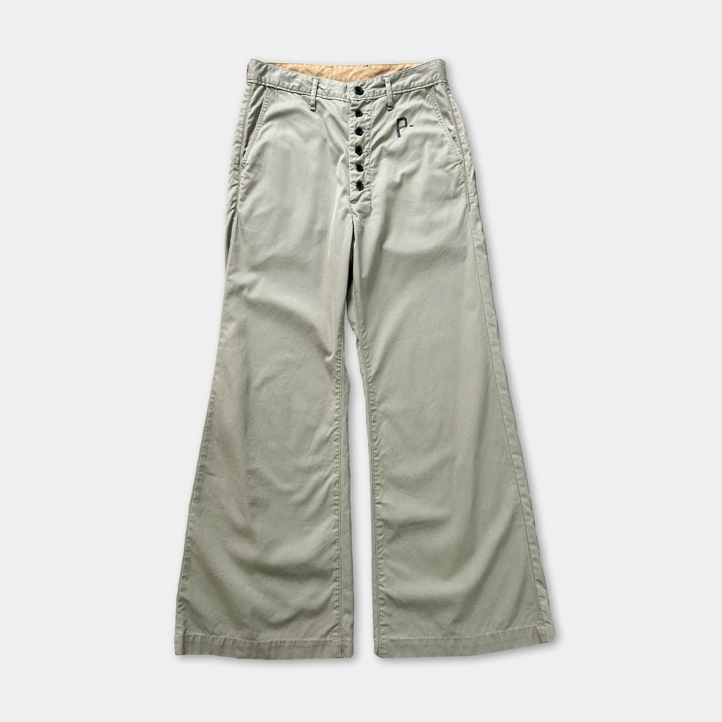 A pair of khaki wide-leg pants with a button closure.