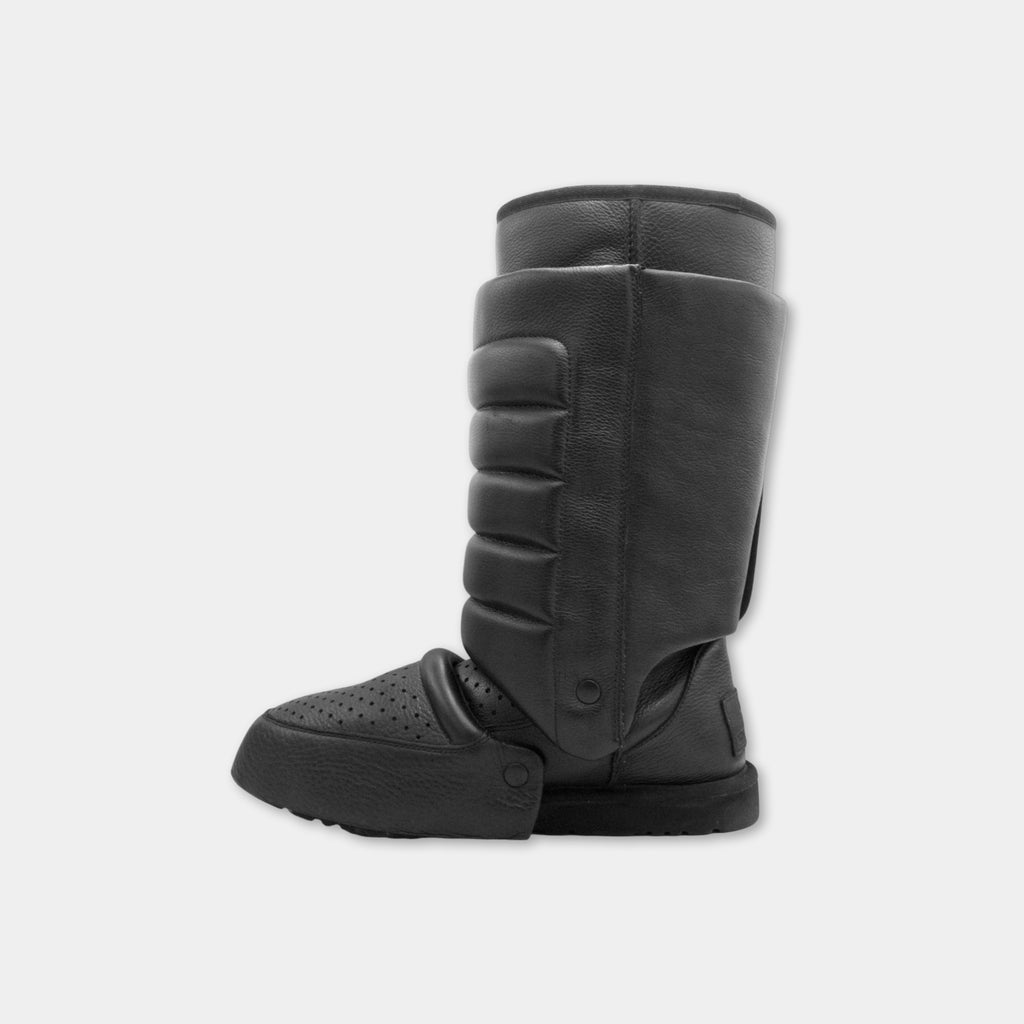 A pair of black leather boots with a distinctive design.