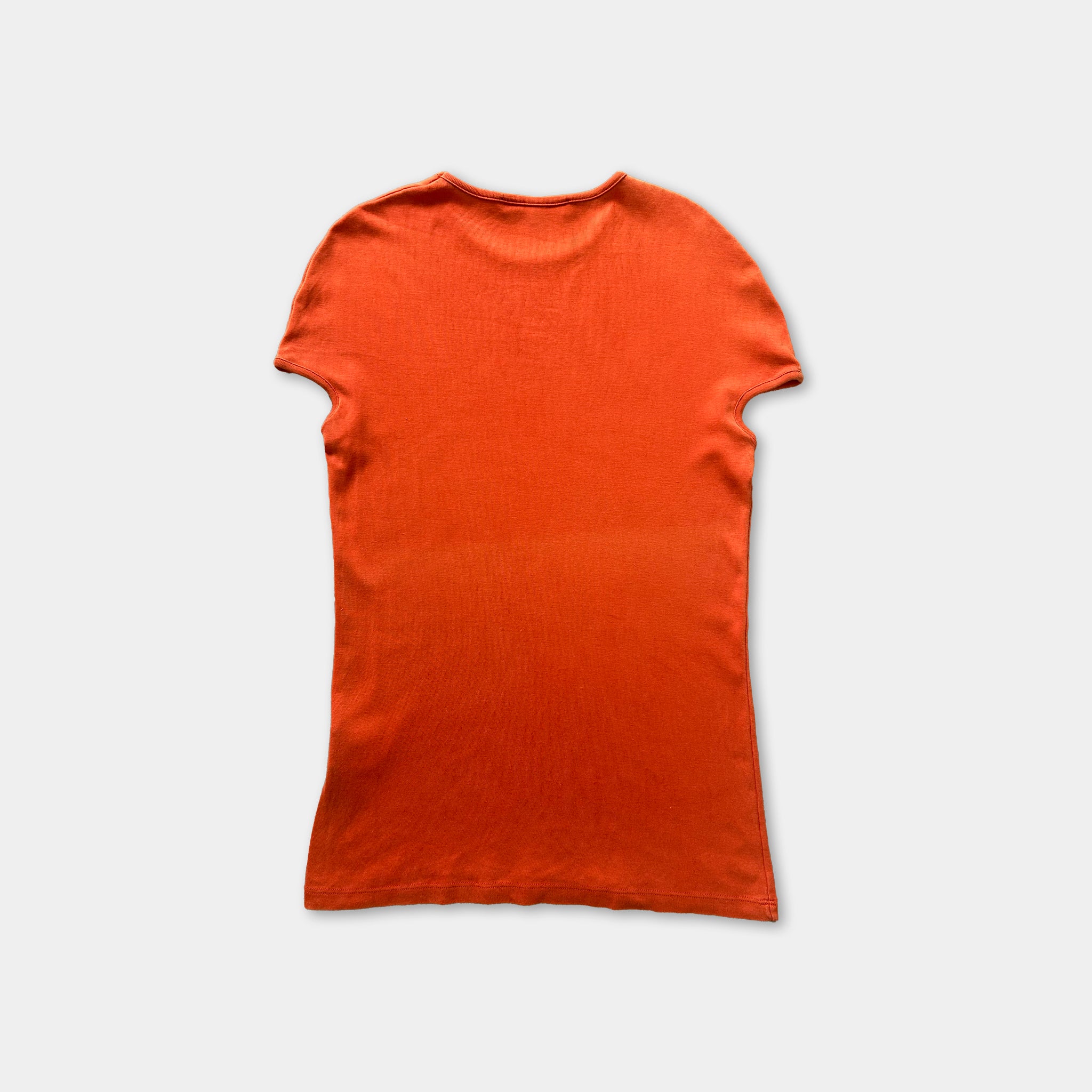 A bright orange t-shirt is displayed against a white background.