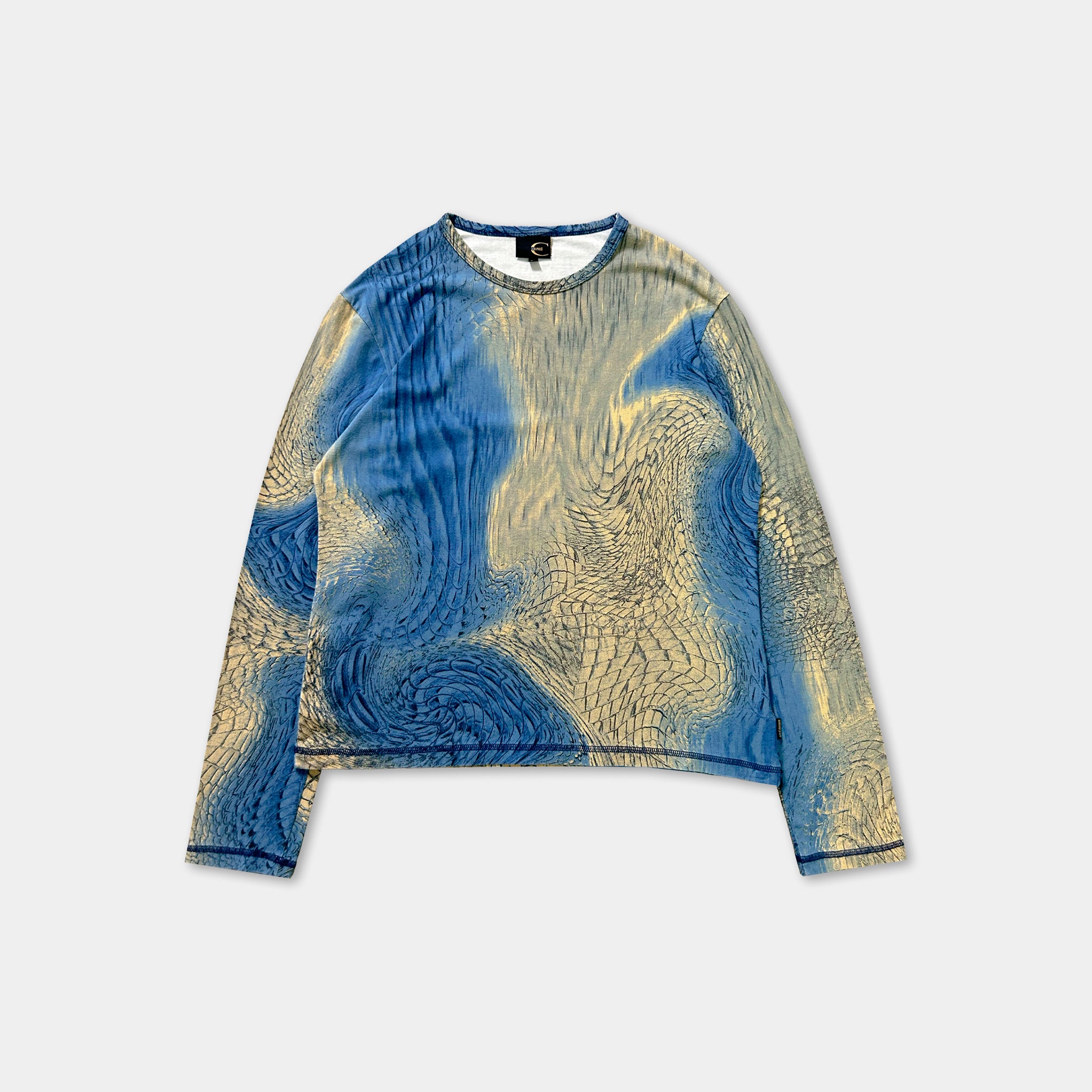 a long-sleeved shirt with a blue and yellow abstract pattern.