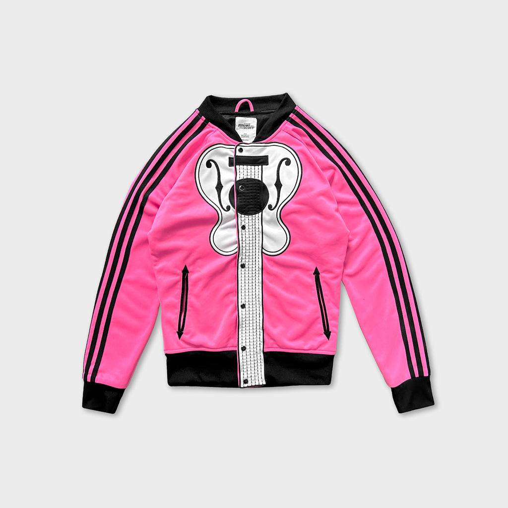A bright pink track jacket with black stripes and a graphic of a guitar on the front.