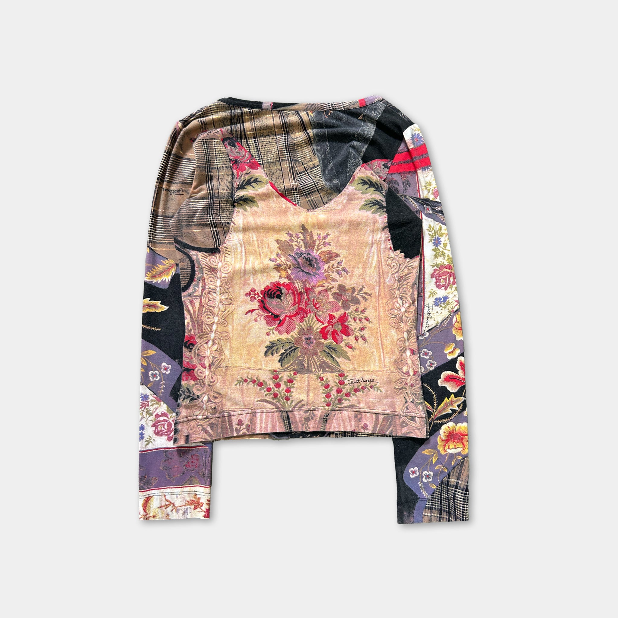 a long-sleeved top with a floral print design.