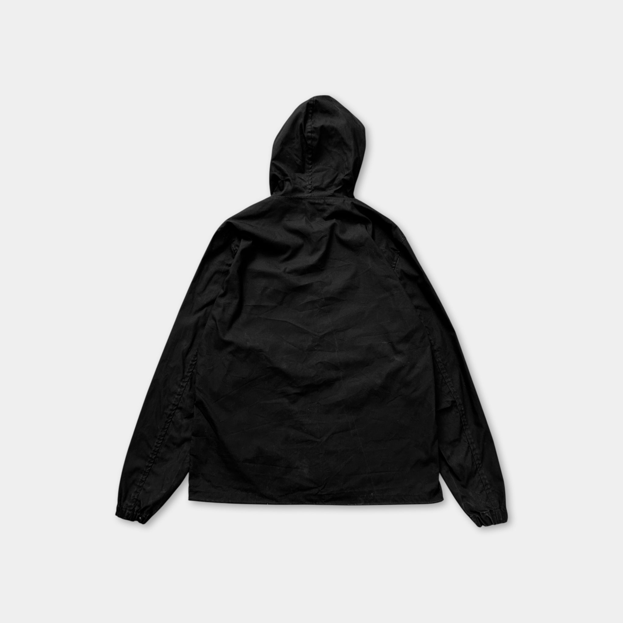 A black hooded jacket is shown against a white background.