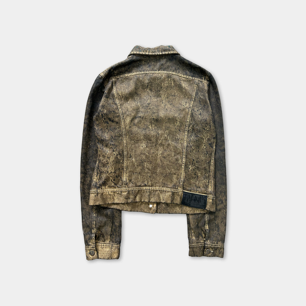 a worn, distressed denim jacket with a faded, distressed appearance.
