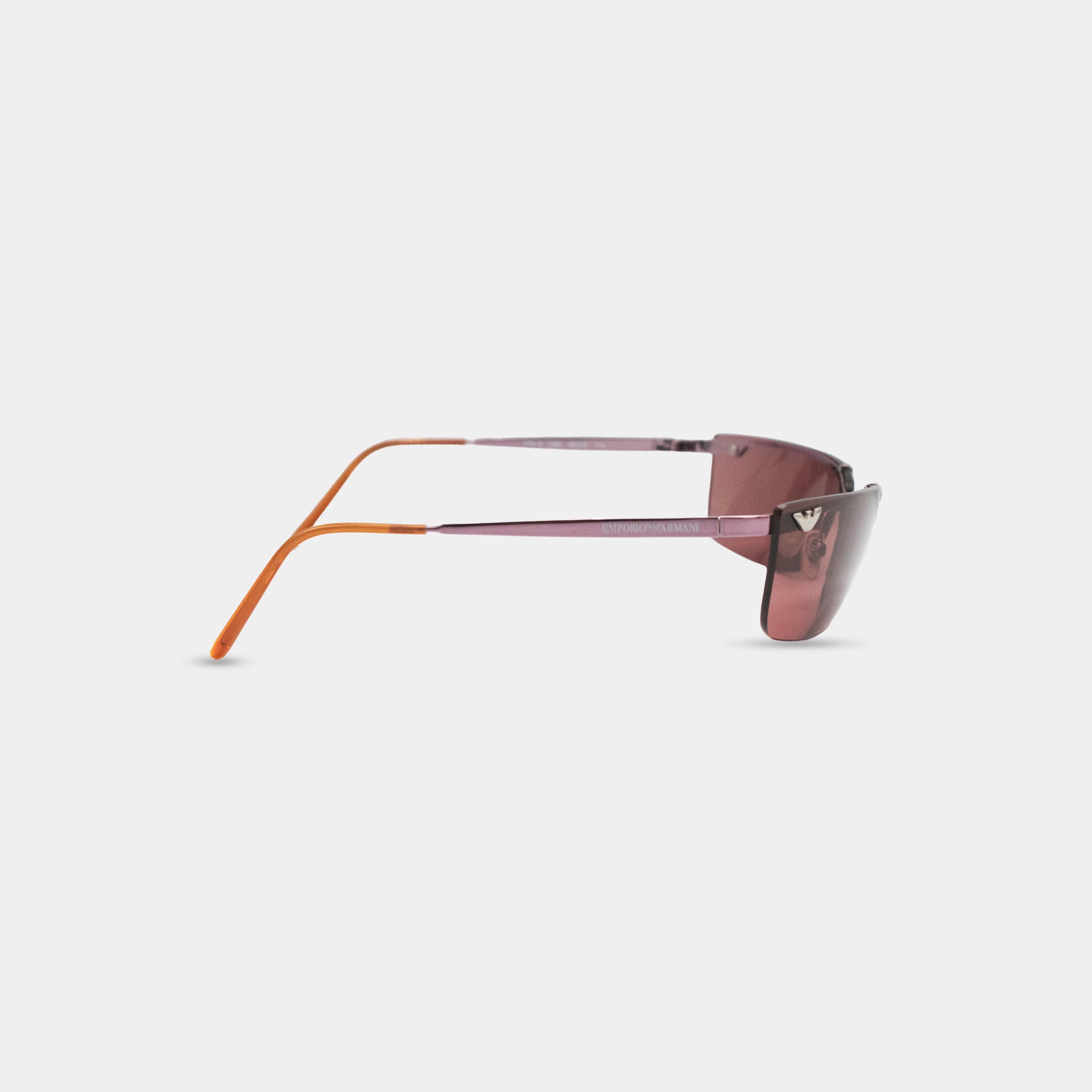 A pair of sunglasses with a pink frame and orange-tinted lenses.