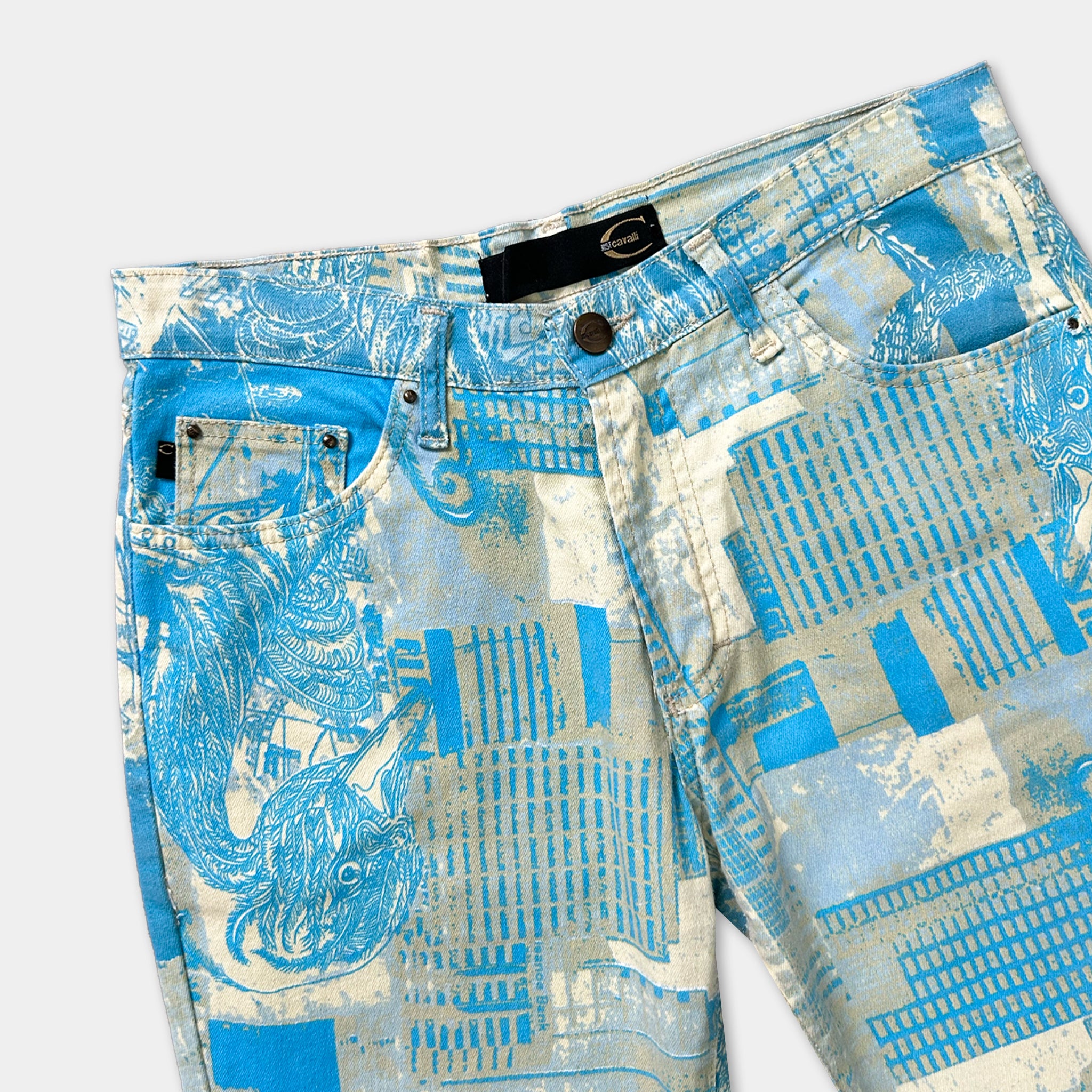 A pair of blue and white patterned jeans with a unique design.