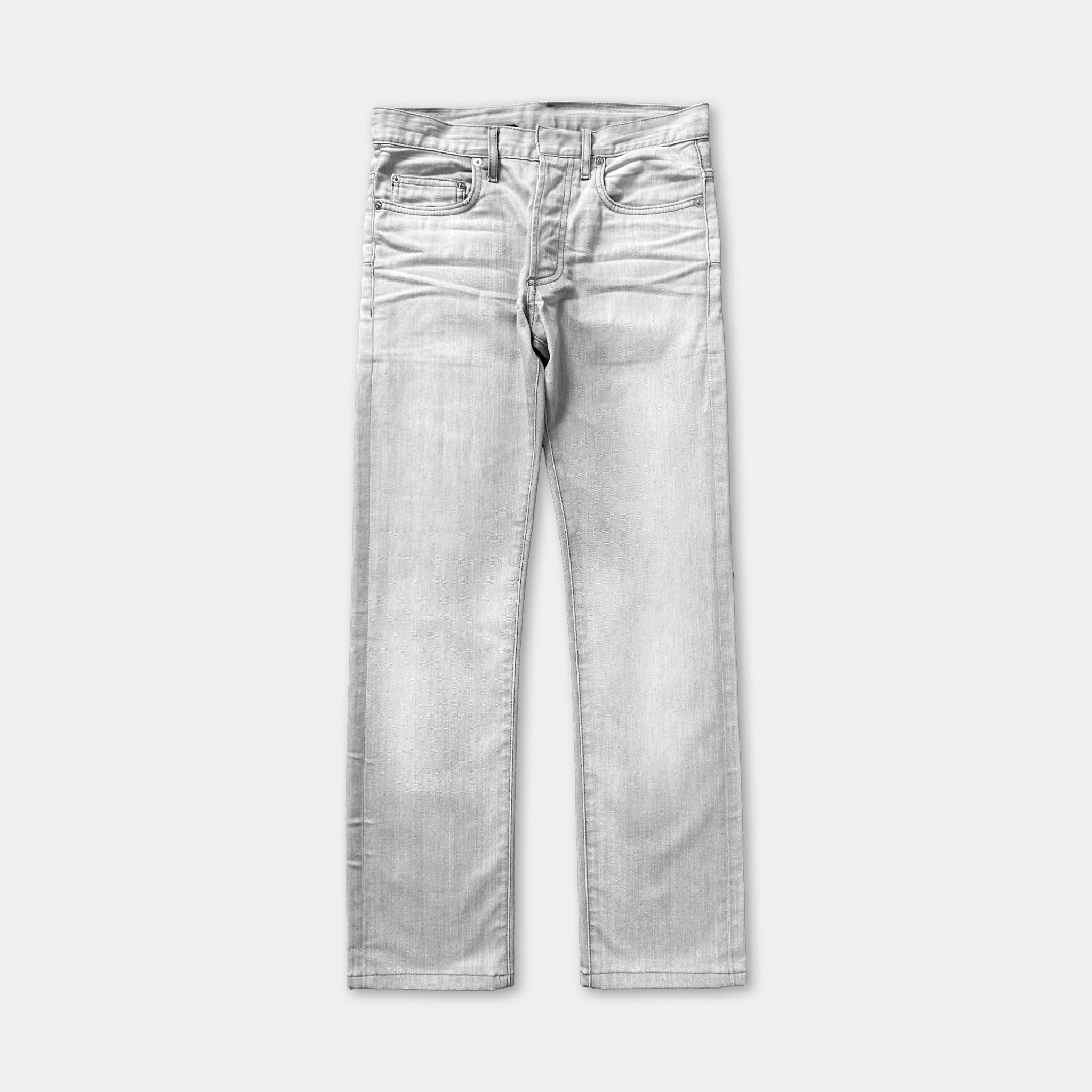 A pair of gray jeans is shown against a white background.