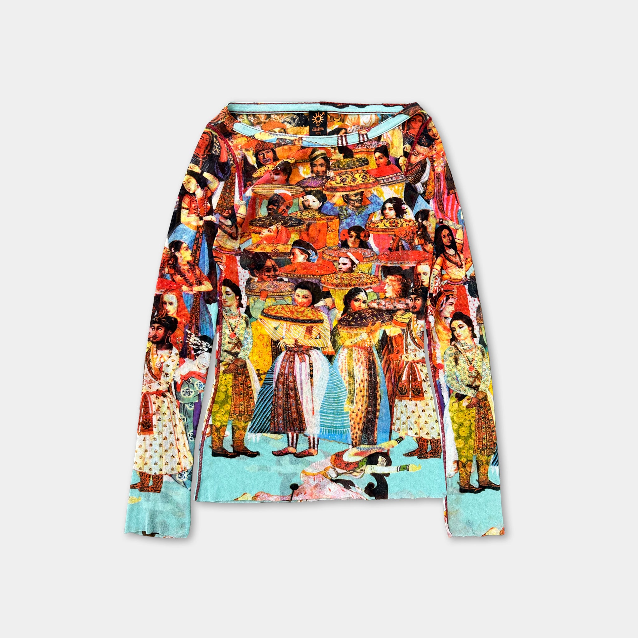 The image is a colorful, patterned long-sleeved shirt with a collage of various images depicting people in different poses and outfits.